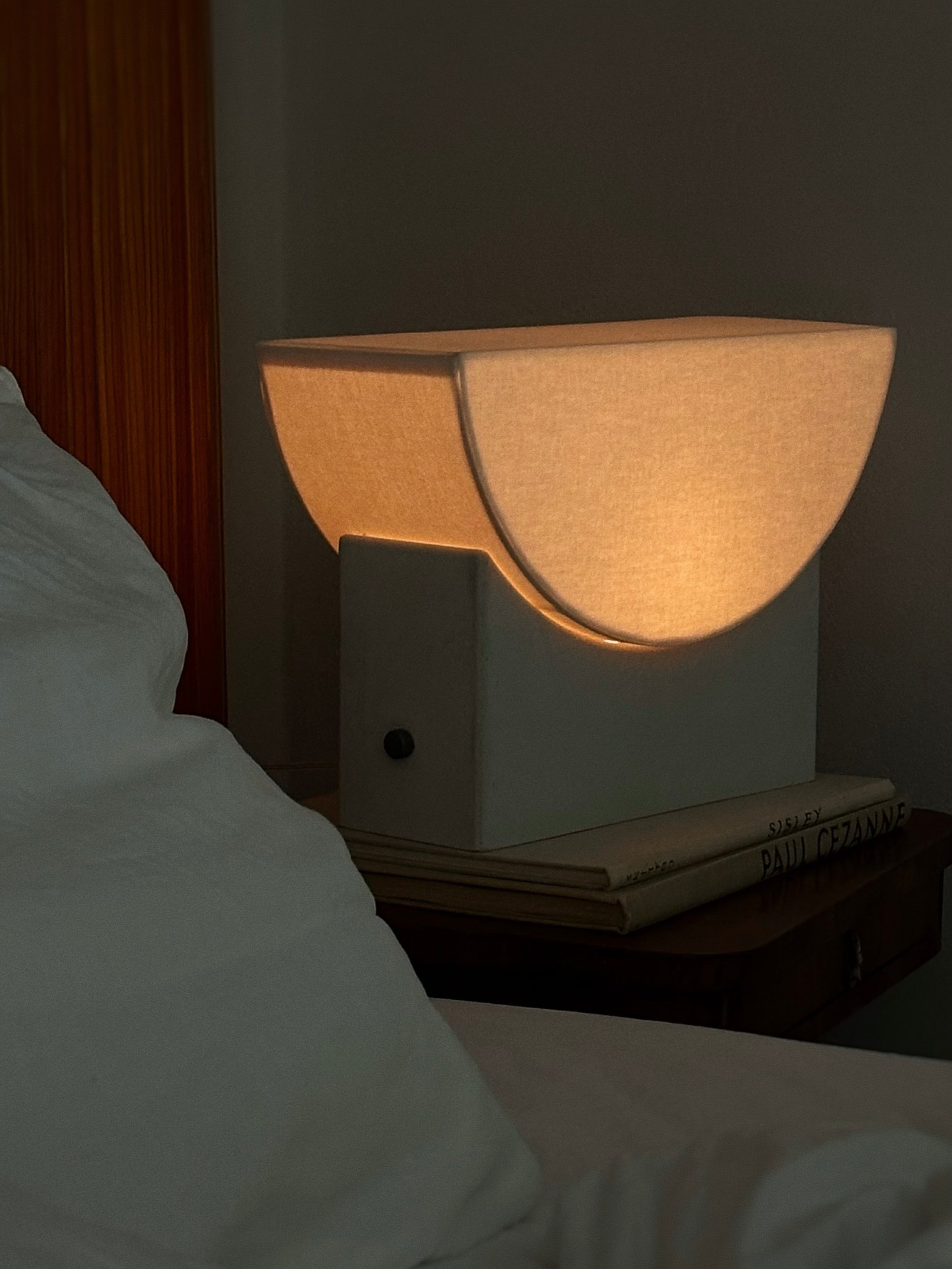 Reminder (001) – Table Lamp – Original — close-up of lamp on bedside table