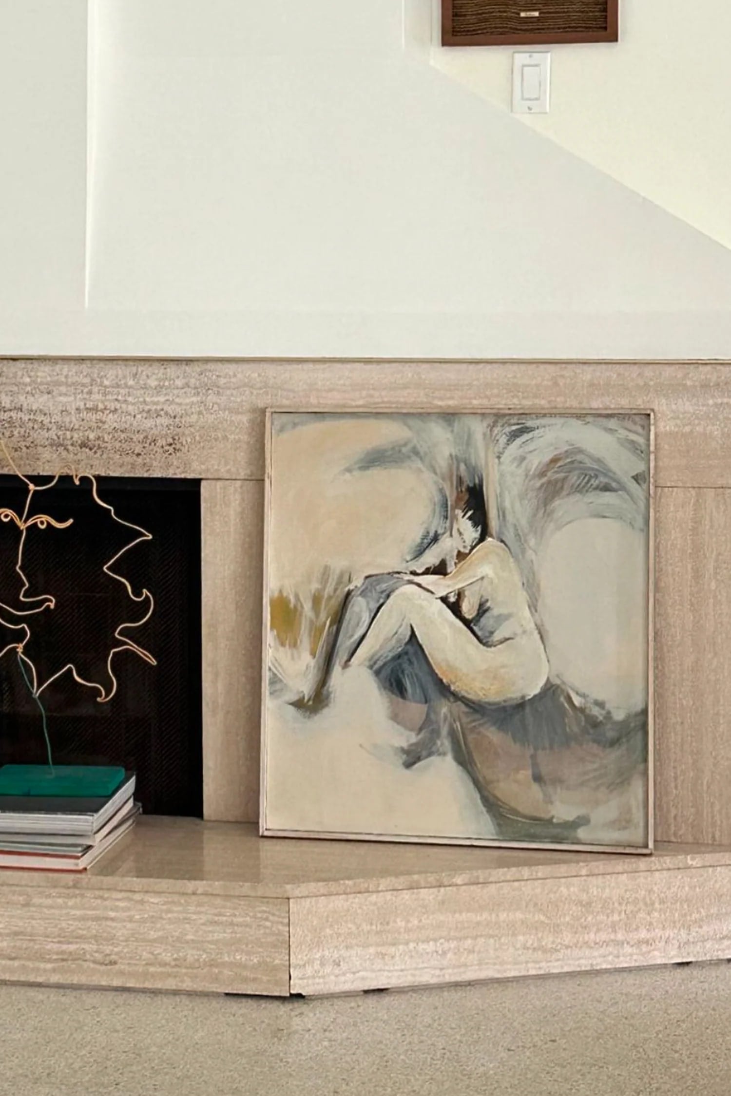 Abstract Figural Painting, 1960s — angled view on stone fireplace mantel