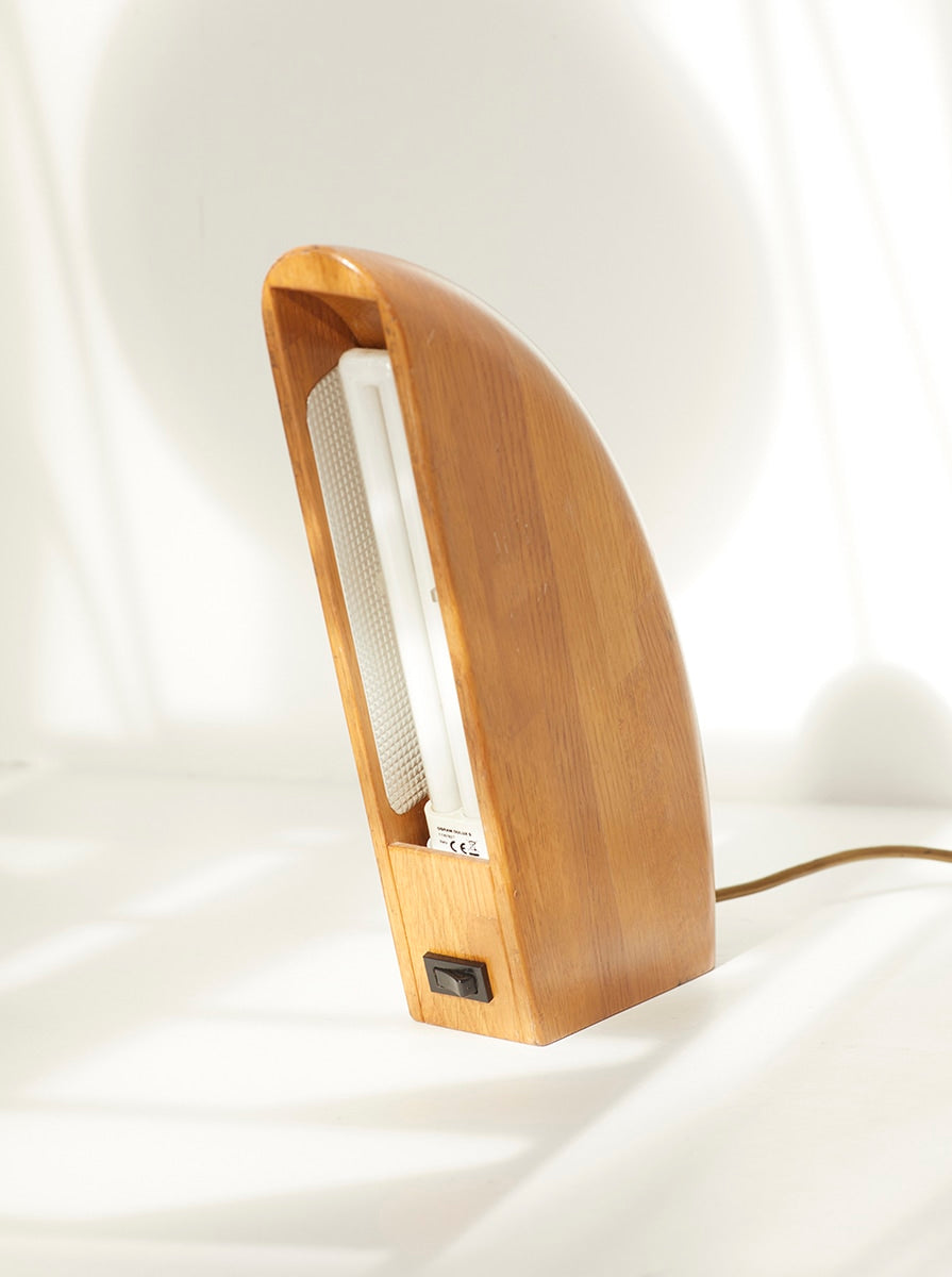Set of 2 Vintage French Artisanal Table Lamps in Solid Oak Wood C. 1980 — angled view highlighting curved wooden design
