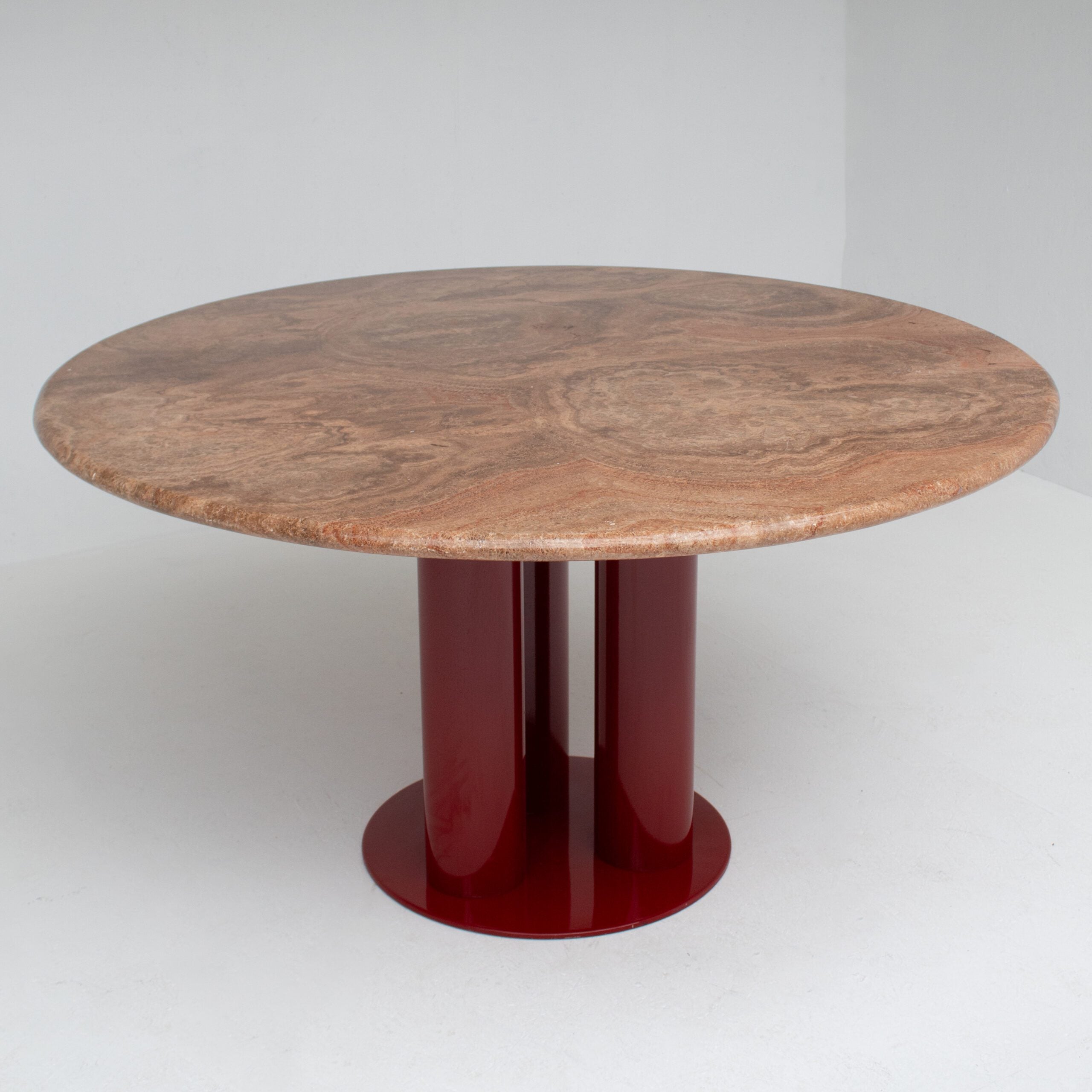 Round Marble Dining Table with Burgundy Lacquered Base — top view of round marble surface