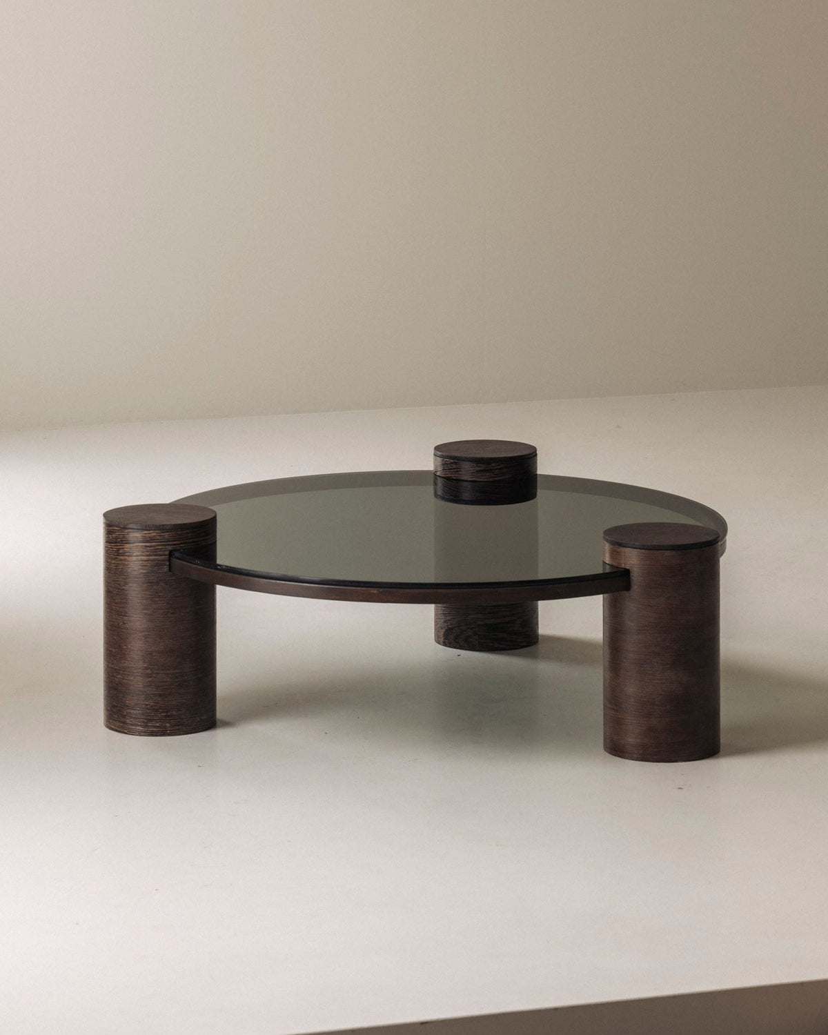 Sculptural Brutalist Wengé and Smoked Glass Round Coffee Table, 1970s — detail view