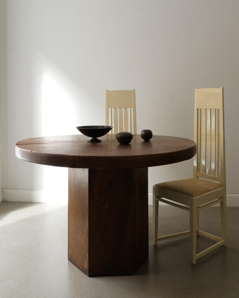 Midcentury hexagonal walnut dining table with cylindrical pedestal base