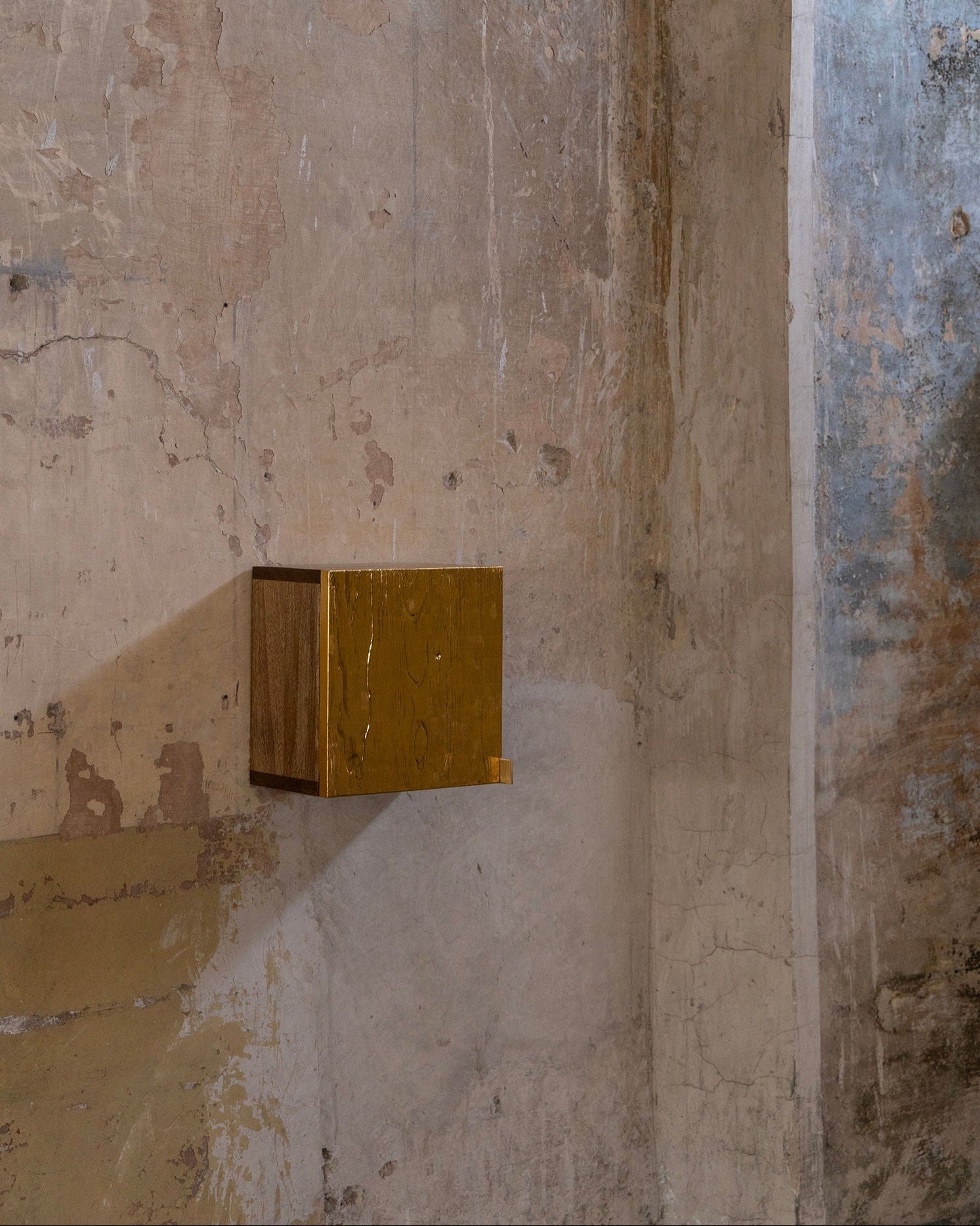 AURUM' Wall Box Cabinets 23k Gold Leaf — side angle against textured wall