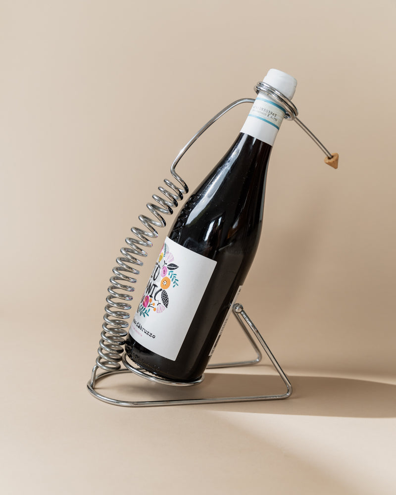 Vintage stainless steel bottle holder with coiled spring design, 1980s