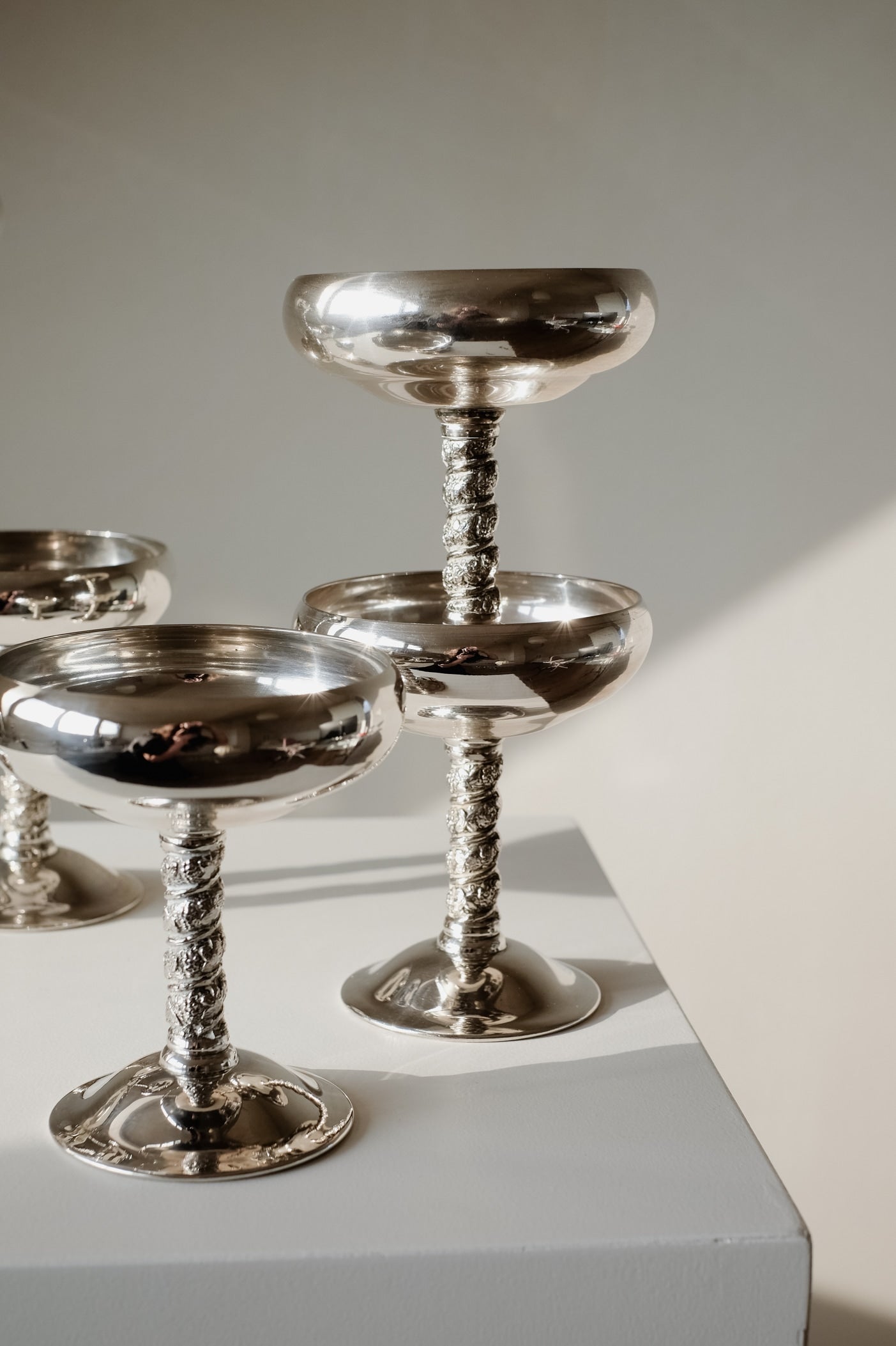 Set of 6 Silver Coupes — close-up of polished silver finish on pedestal