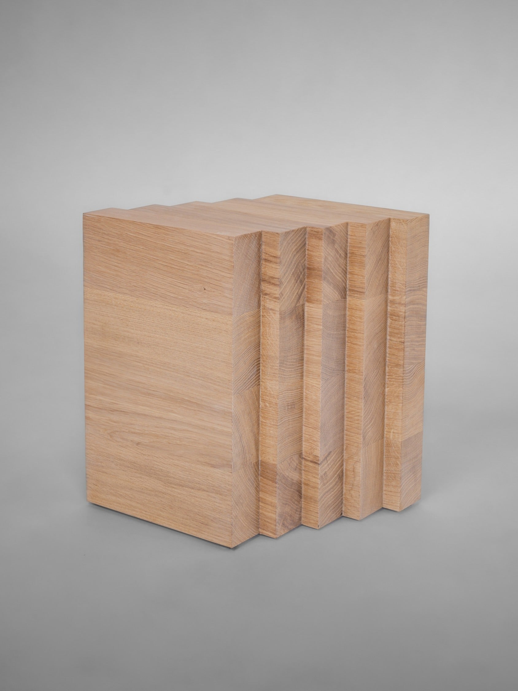 Scalae Side Table — top view of stacked wooden blocks