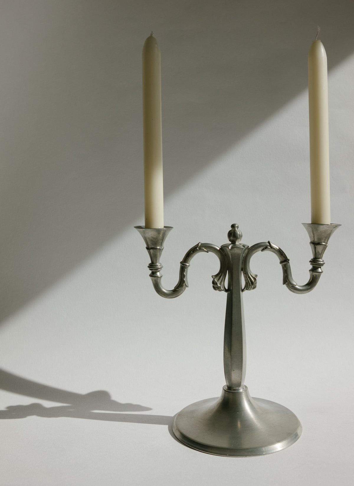 Pair of Harald Linder for Svenskt Tenn Swedish Grace Pewter Candelabra - 1930 — lifestyle setting