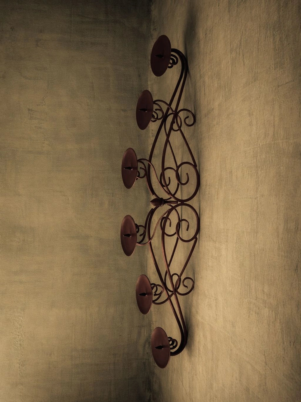 Vintage Wrought Iron Candle Holders in Metal — side angle