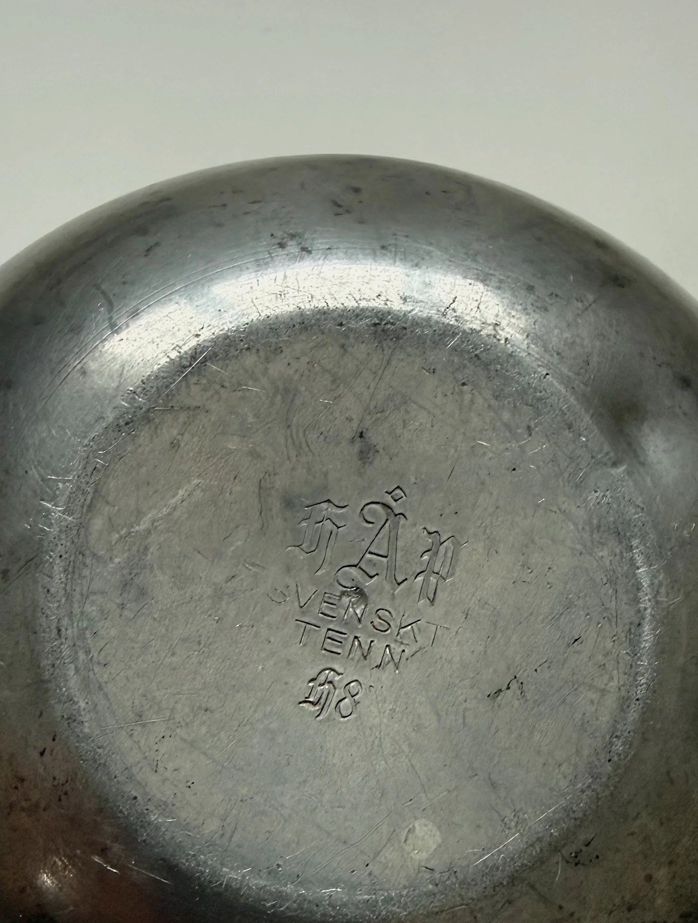 Swedish Grace Spherical Pewter Vase, 1934 — top view of polished pewter base