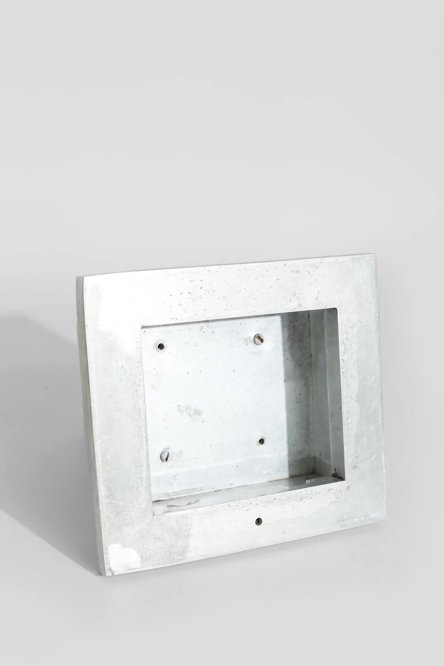 Art Deco Coin Bank — side angle showing brushed metal finish