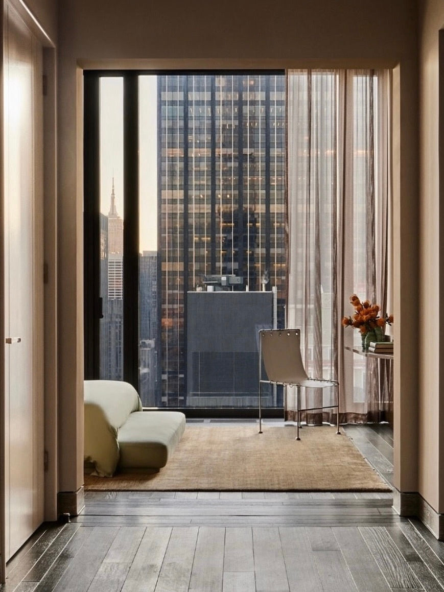 Institution Sculptural Chair, Leather — lifestyle setting