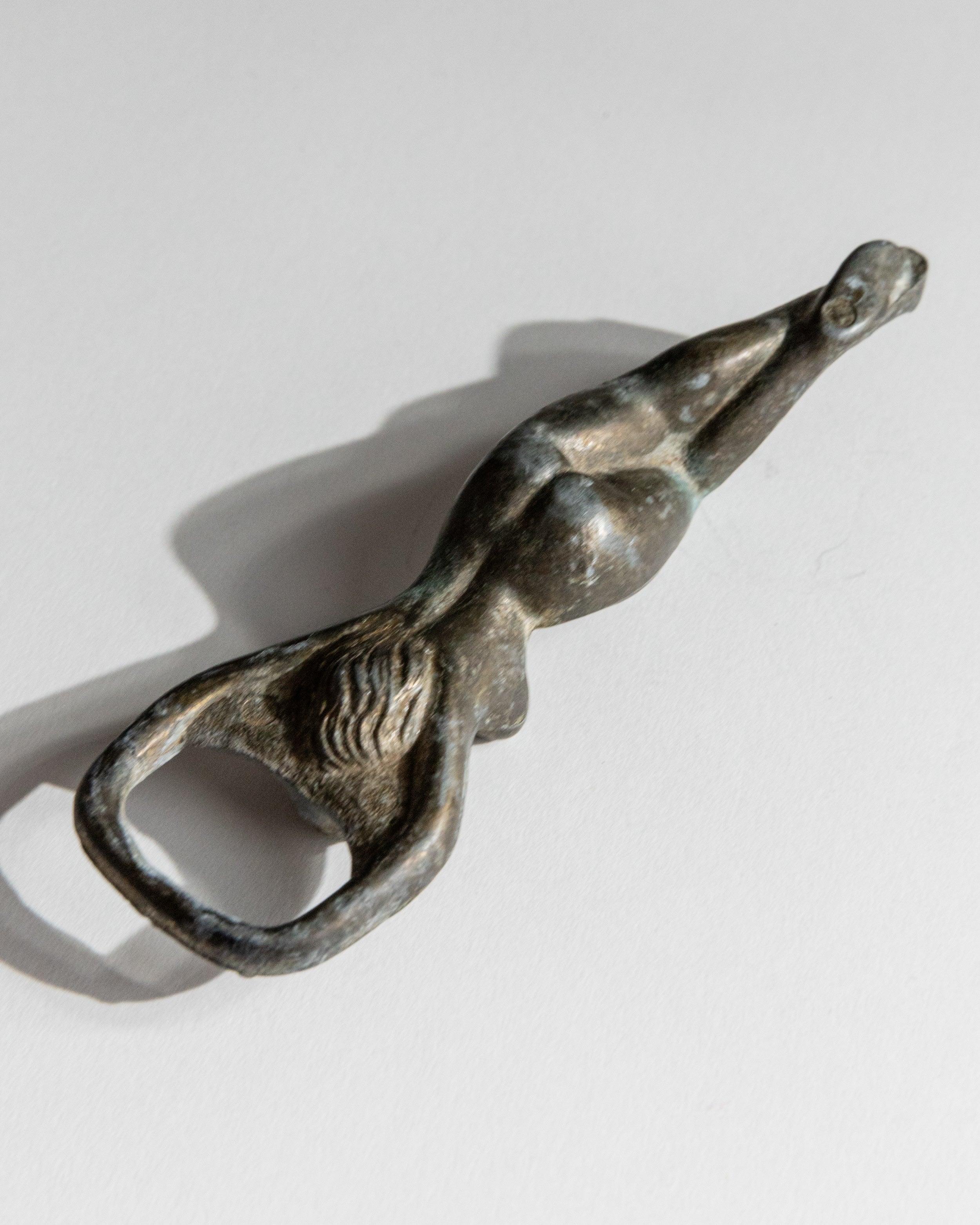 Vintage 1940s Bottle Opener Brass, Nude Woman Shape — side angle showing detailed figure and handle