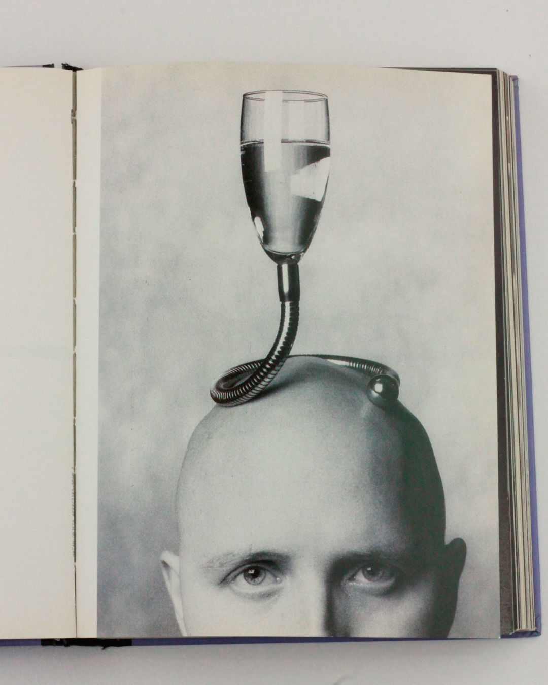 Objets Affectifs: Le Nouveau Design de la Table' Book — black and white image of a man with glass on head