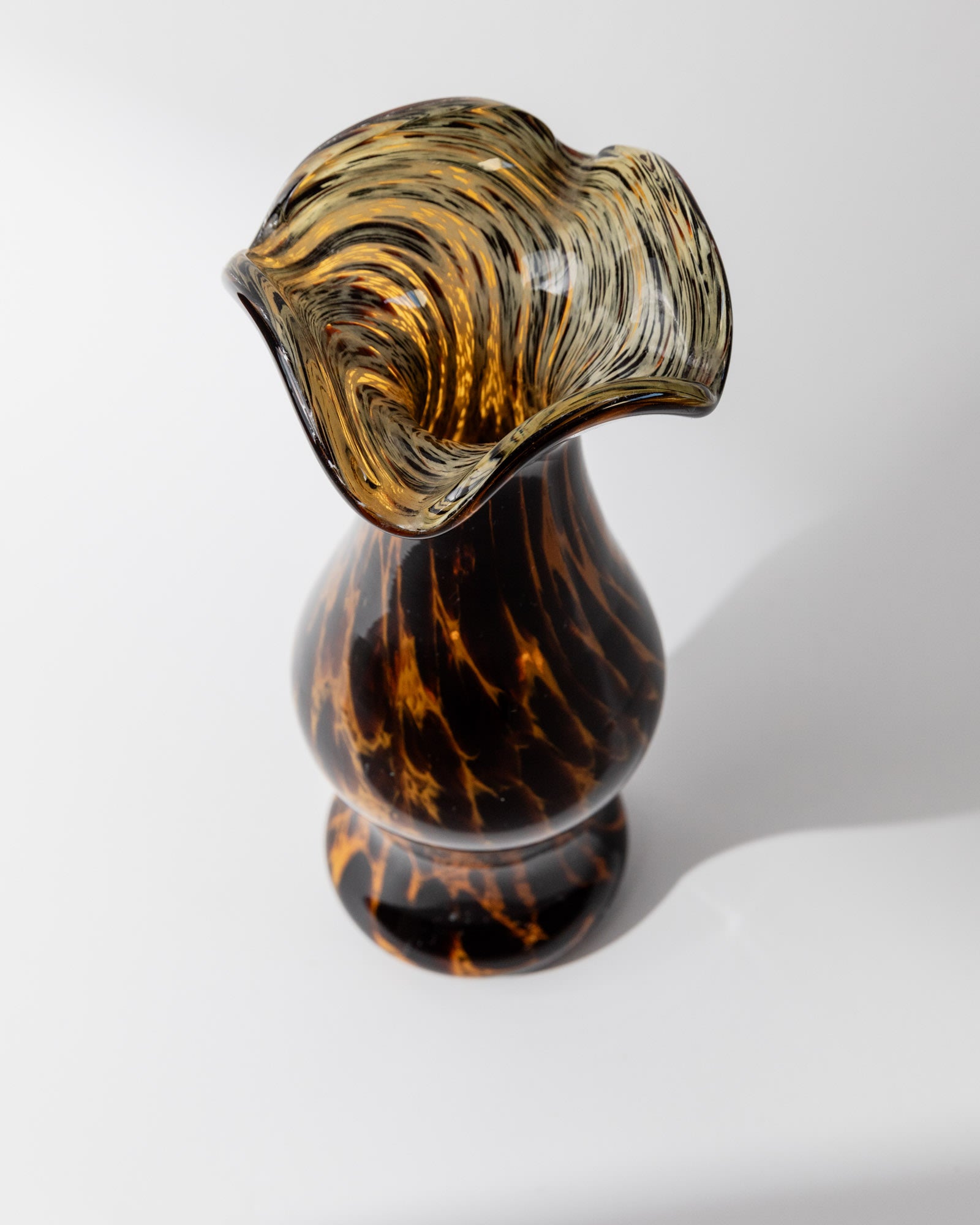 Amber Murano glass vase with ruffled rim and swirled pattern detail