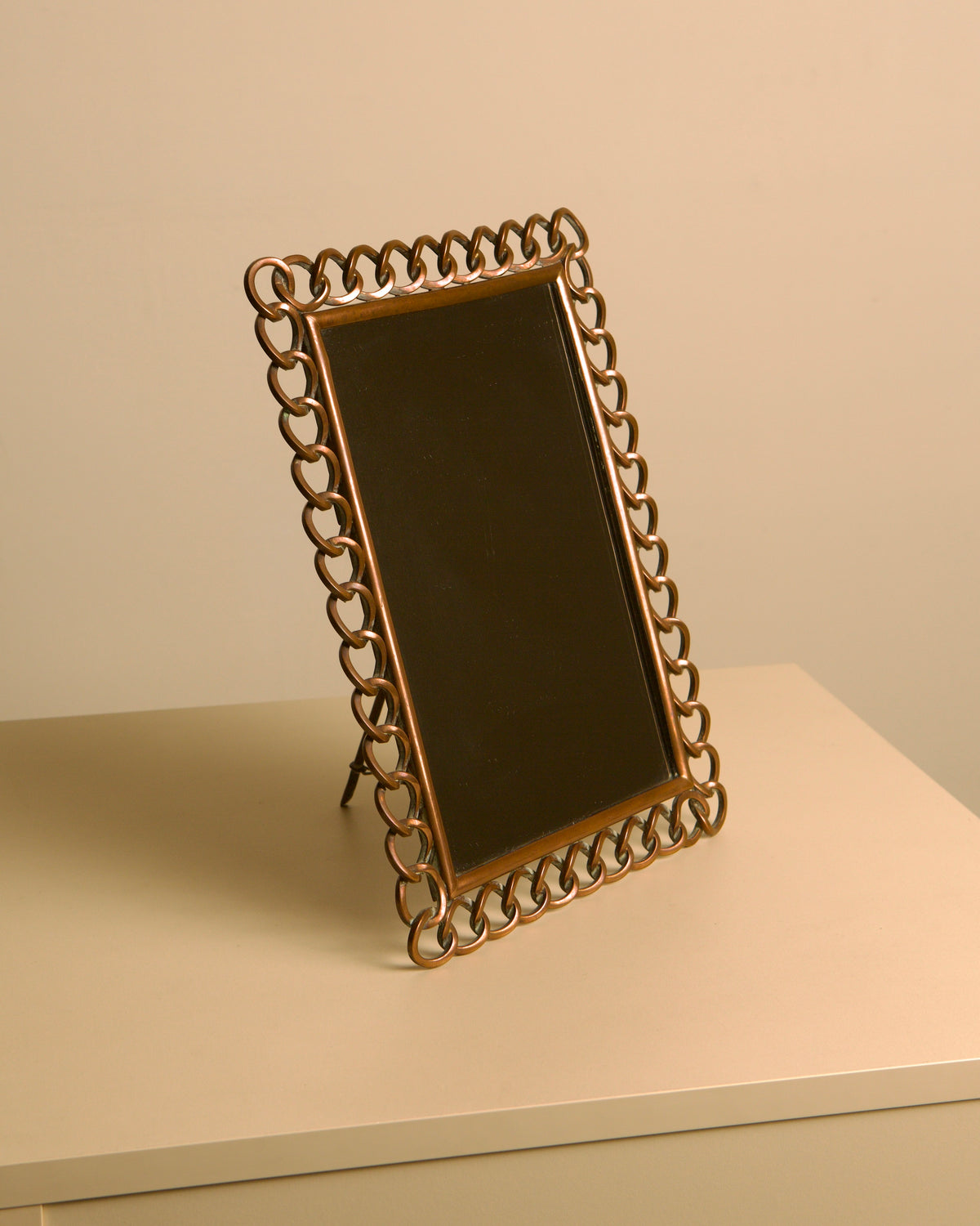 Dutch copper mirror by the Amsterdam School, 1920s — detail view