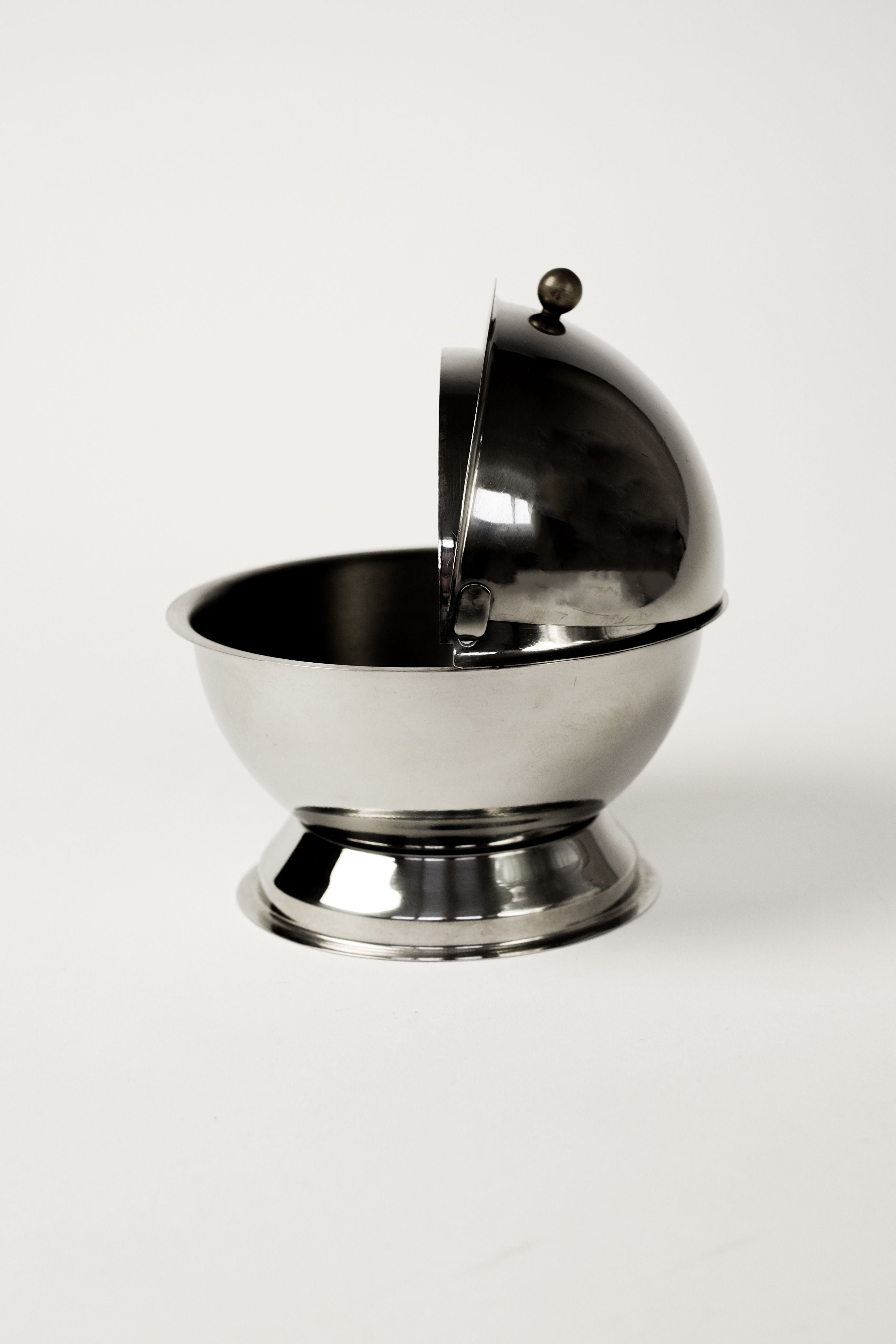 Circle Sugar Bowl — side angle showing polished stainless steel finish
