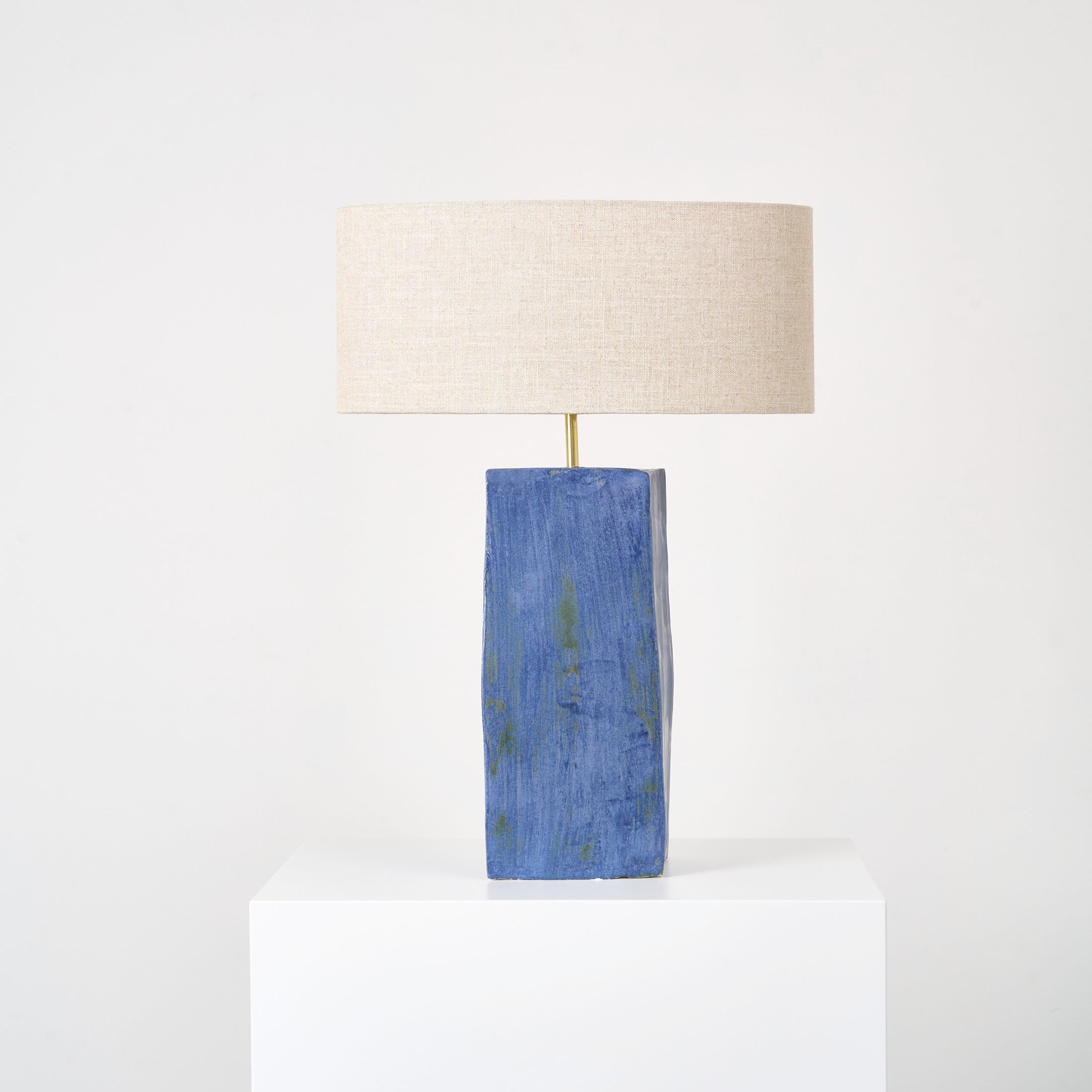 Rectangular Ceramic Lamp — top view of blue ceramic base with linen shade
