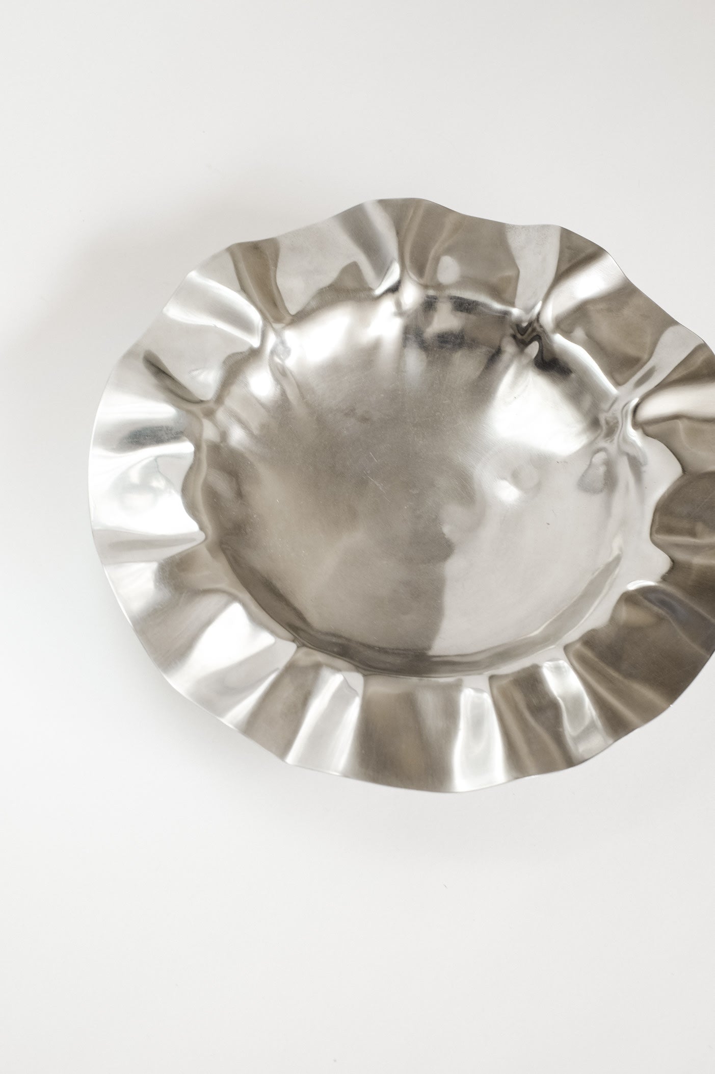 Wavy Display Bowl with Ball Feet — side angle
