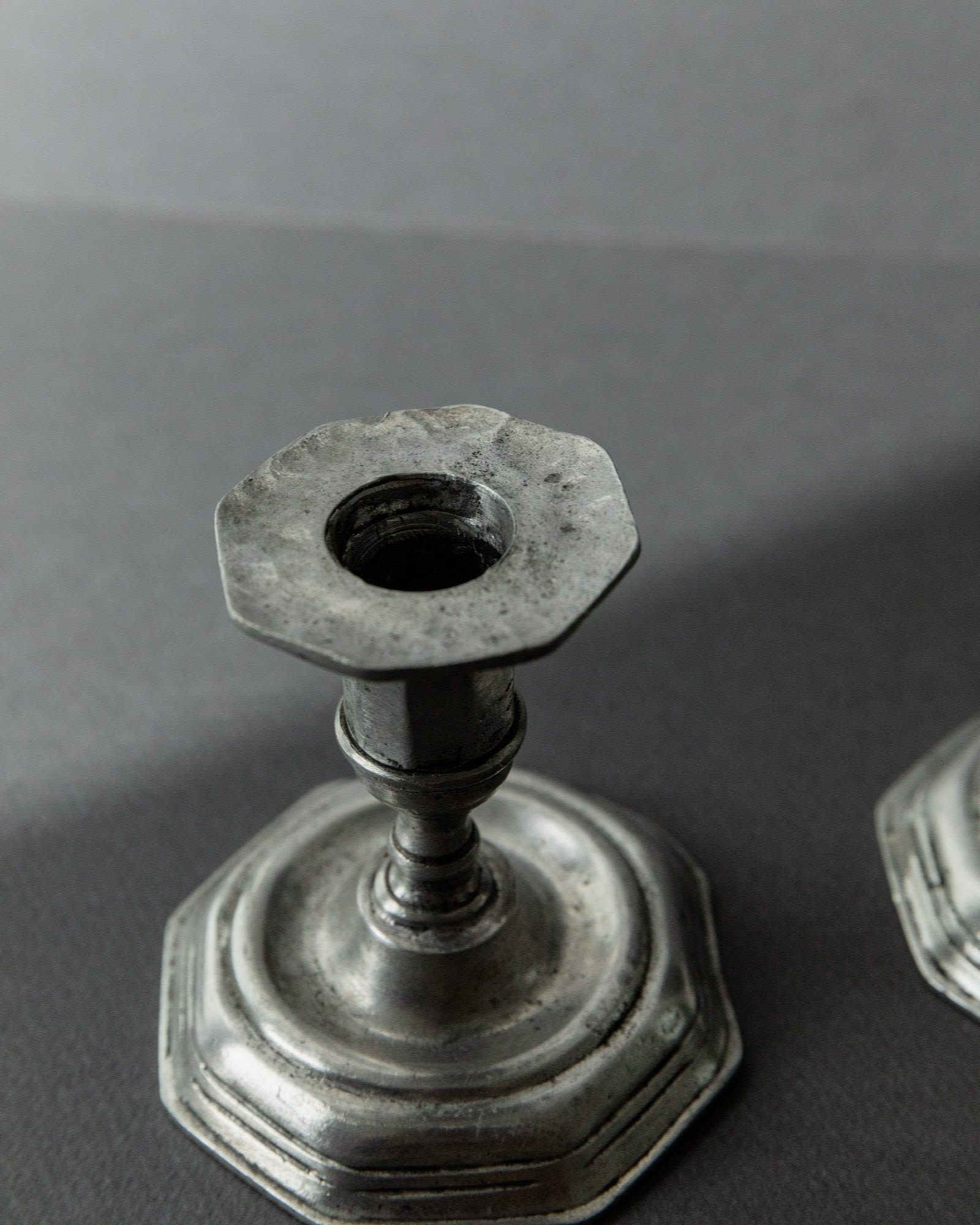 1900s Pewter Candleholders Set of 2 — back view showing octagonal bases