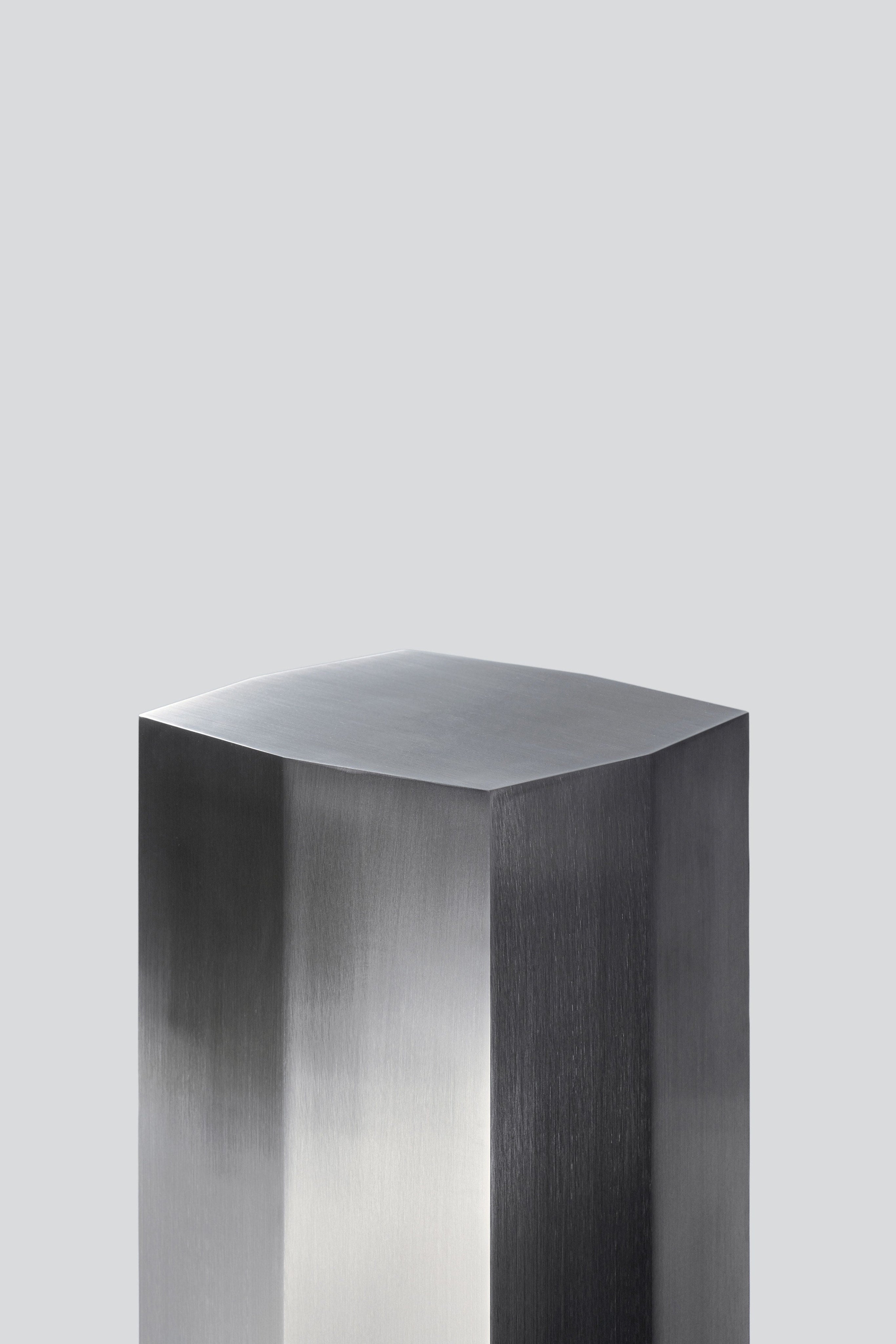 Ame II' Steel Pedestal — close-up of brushed steel surface
