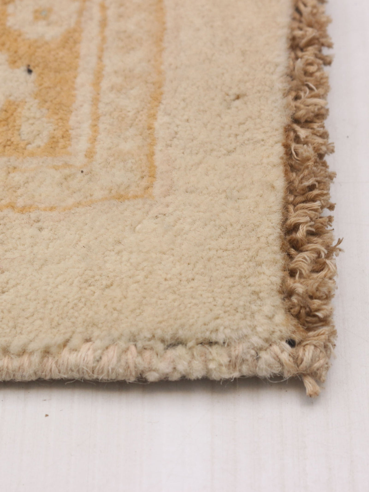 vintage rug in chamois 241 x 300 cm — side angle