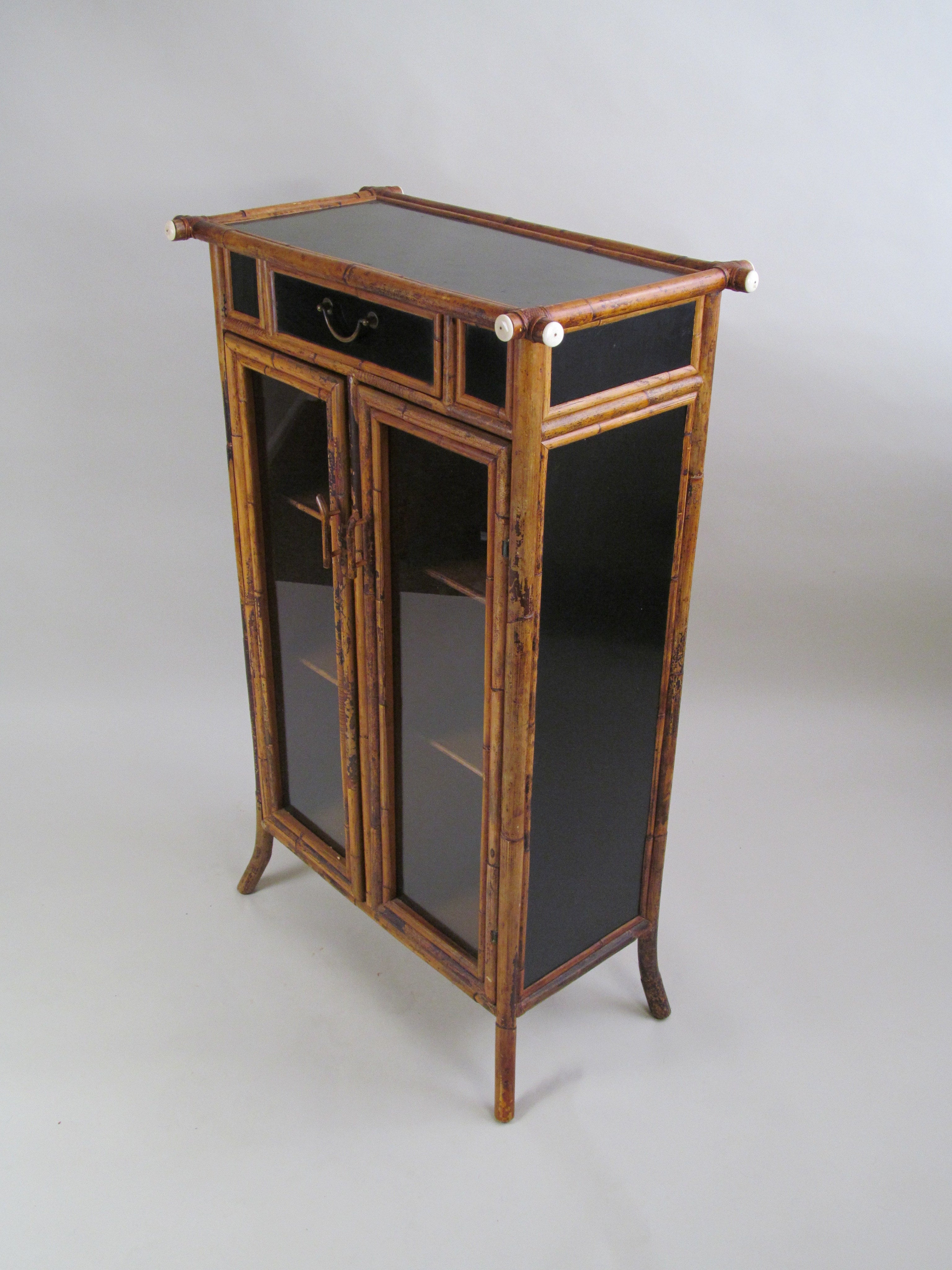 Cabinet by E.Murio Manila, c1980's — side angle showing black glass doors
