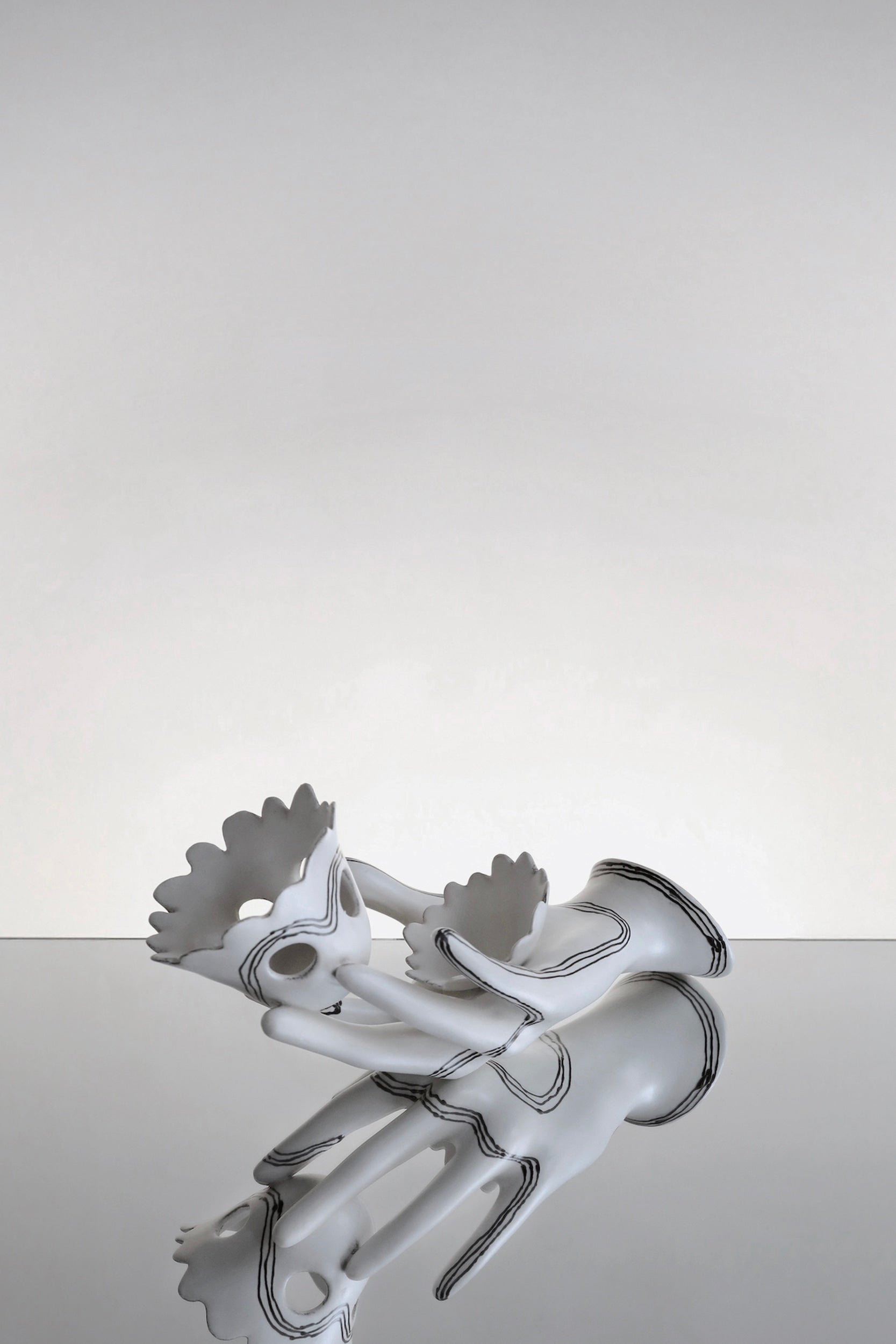 Wall Candle Holders in Ceramic and Glazed Ceramic — close-up