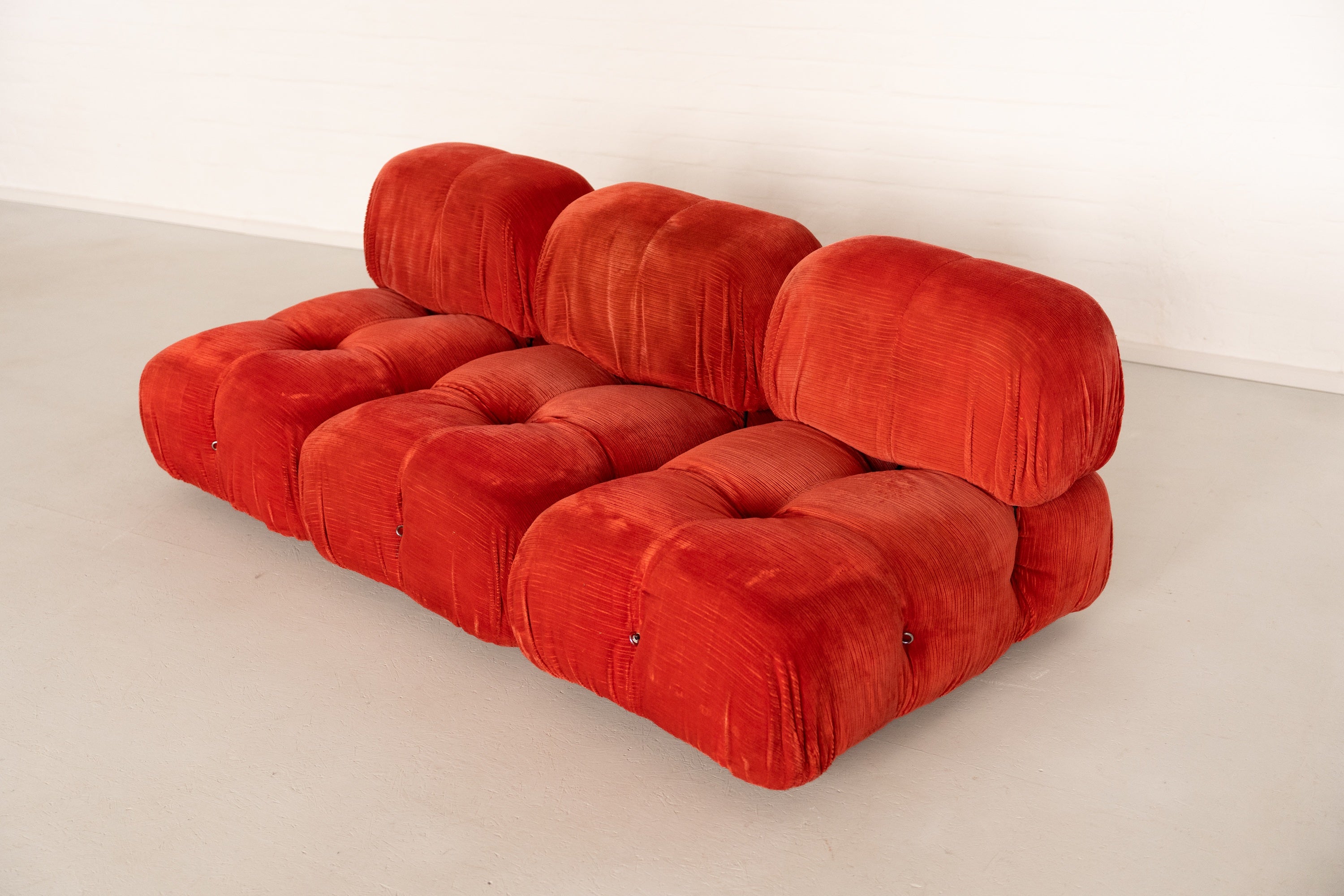 Camaleonda Modular Sofa by Mario Bellini for B&B Italia — side view in vibrant orange upholstery