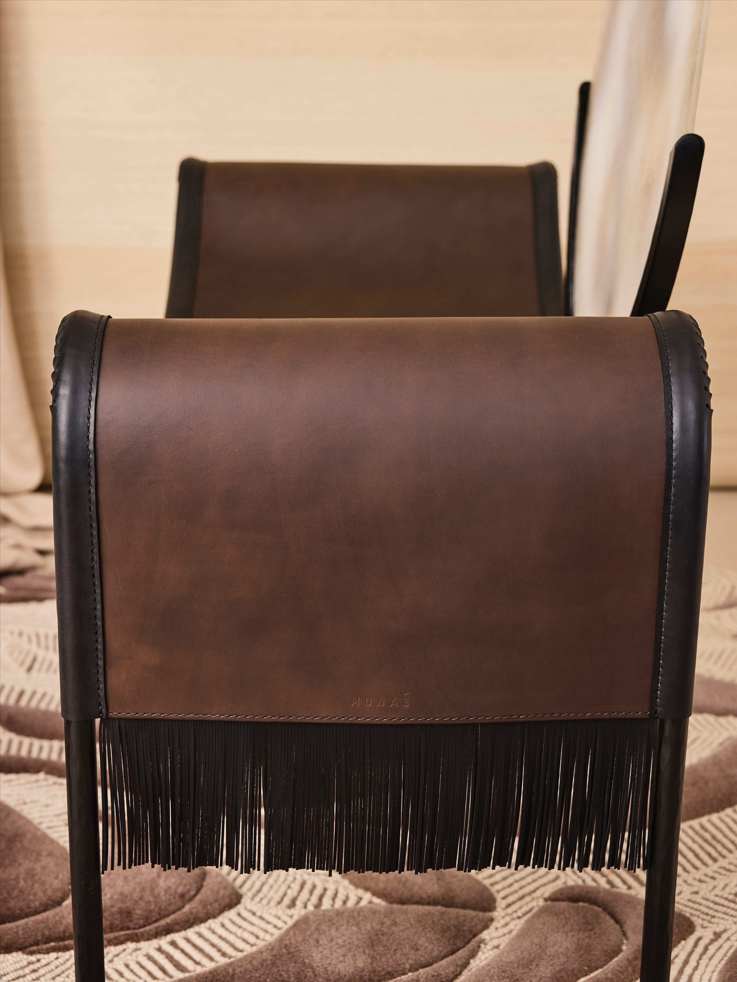MOON Armchair in Metal and Glass — rear view highlighting leather fringe detail