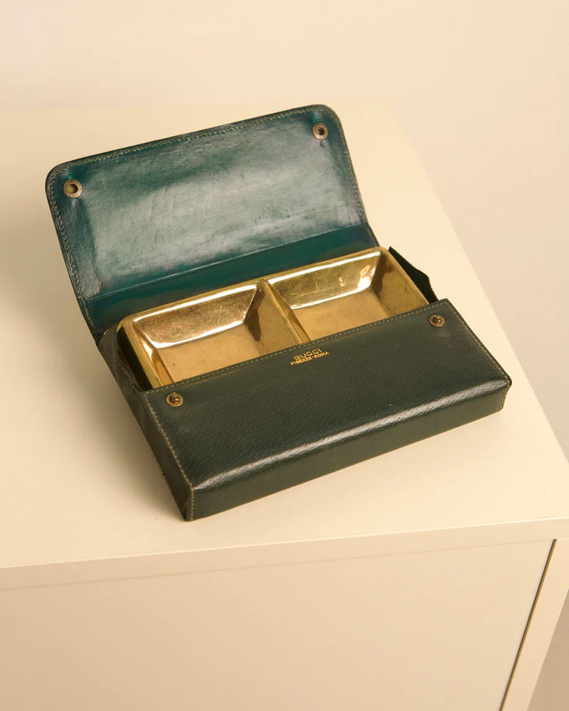 Gucci 40s vide-poche open revealing golden metal compartments