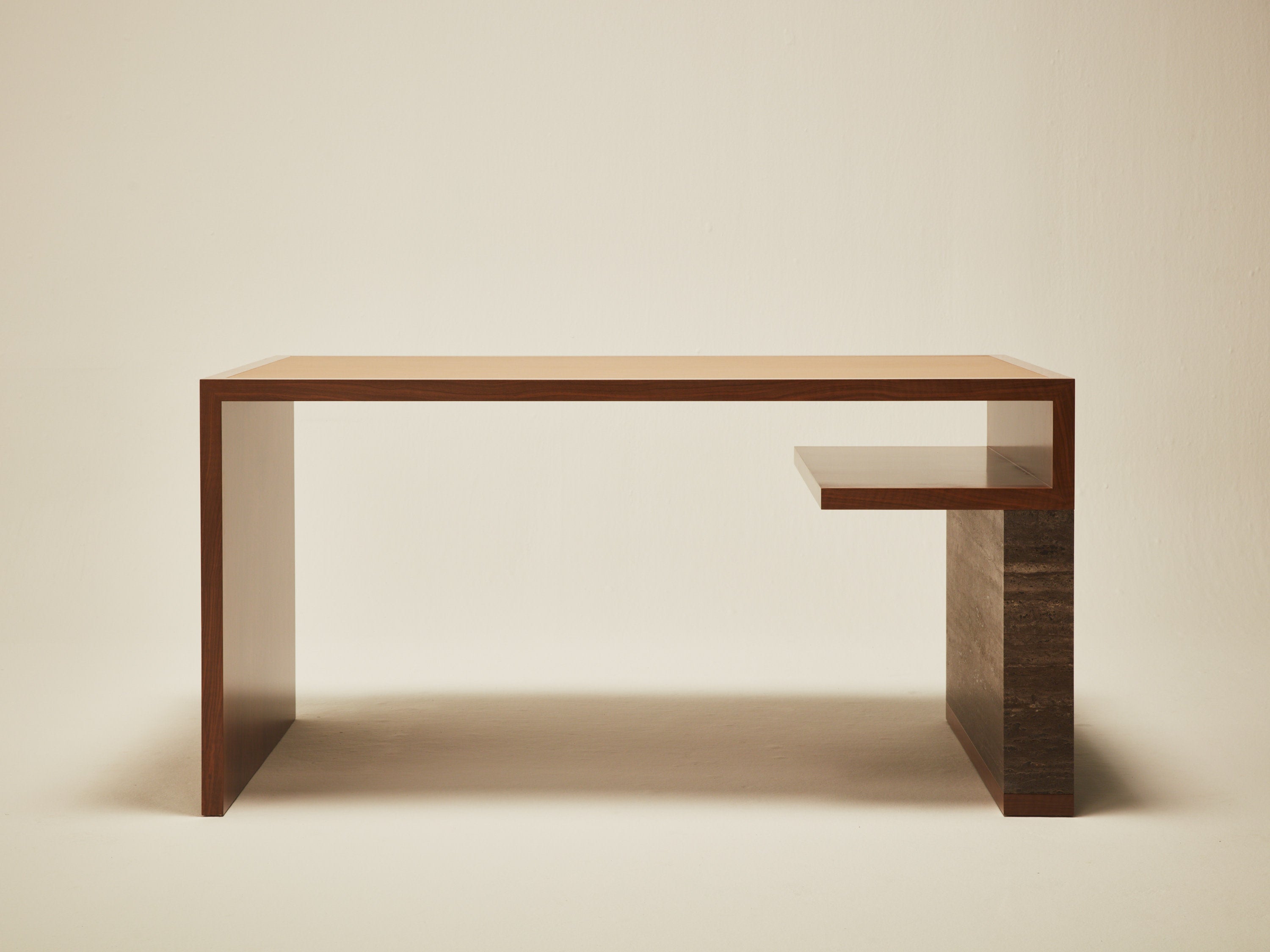 'Continuous' Desk Handcrafted in Wood Veneer With a Lether Tabletop & Travertine Leg — lifestyle setting