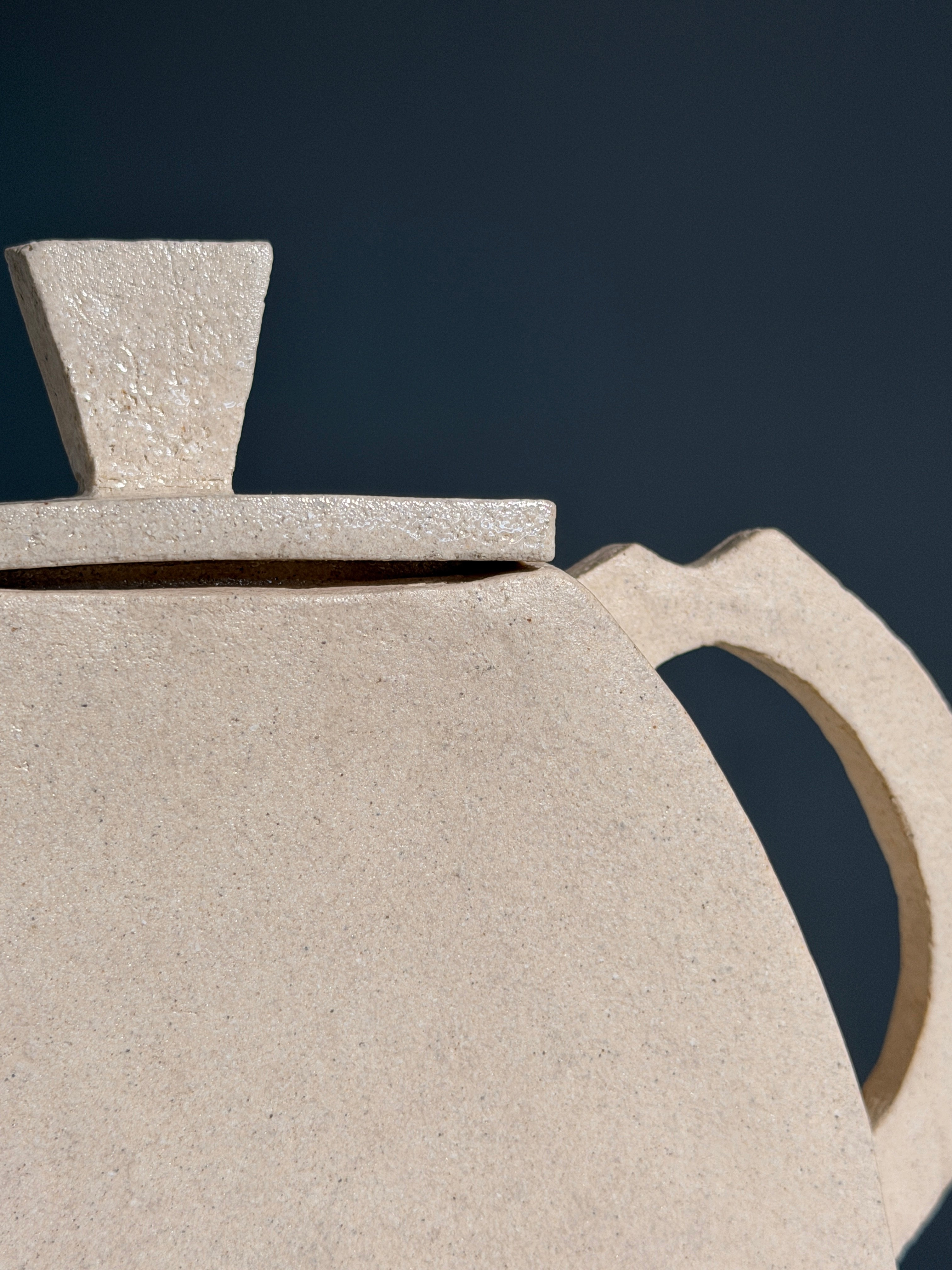 Geometric sculptural stoneware teapot, France, 1990 — side angle