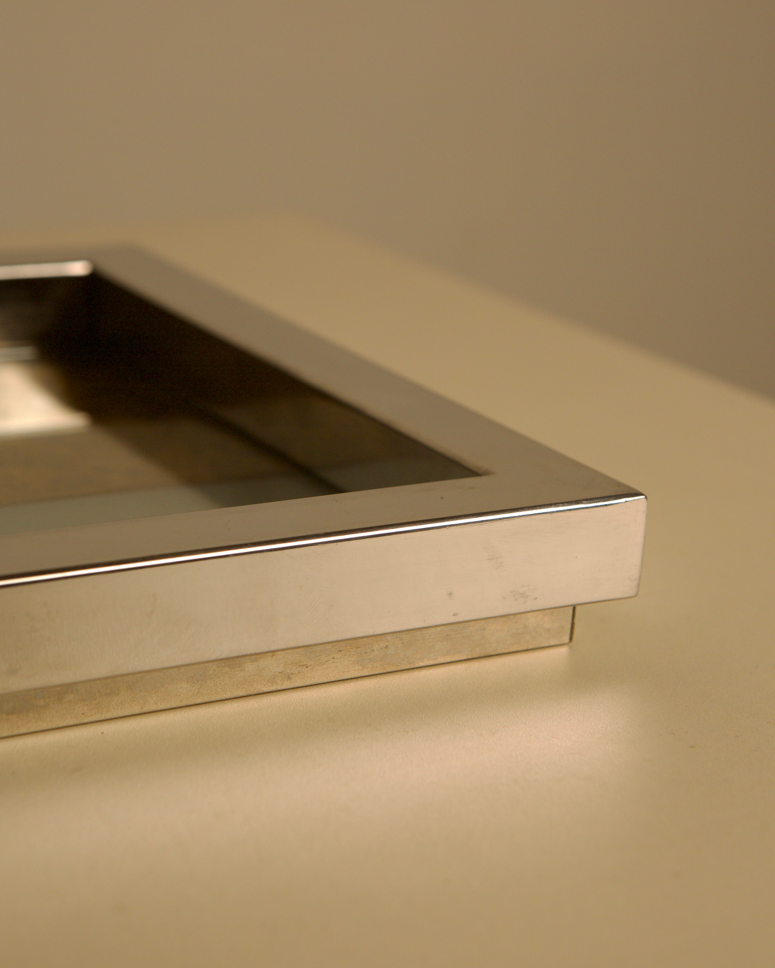 Italian square metal, glass, wood-effect and 70s patina catchall — in context