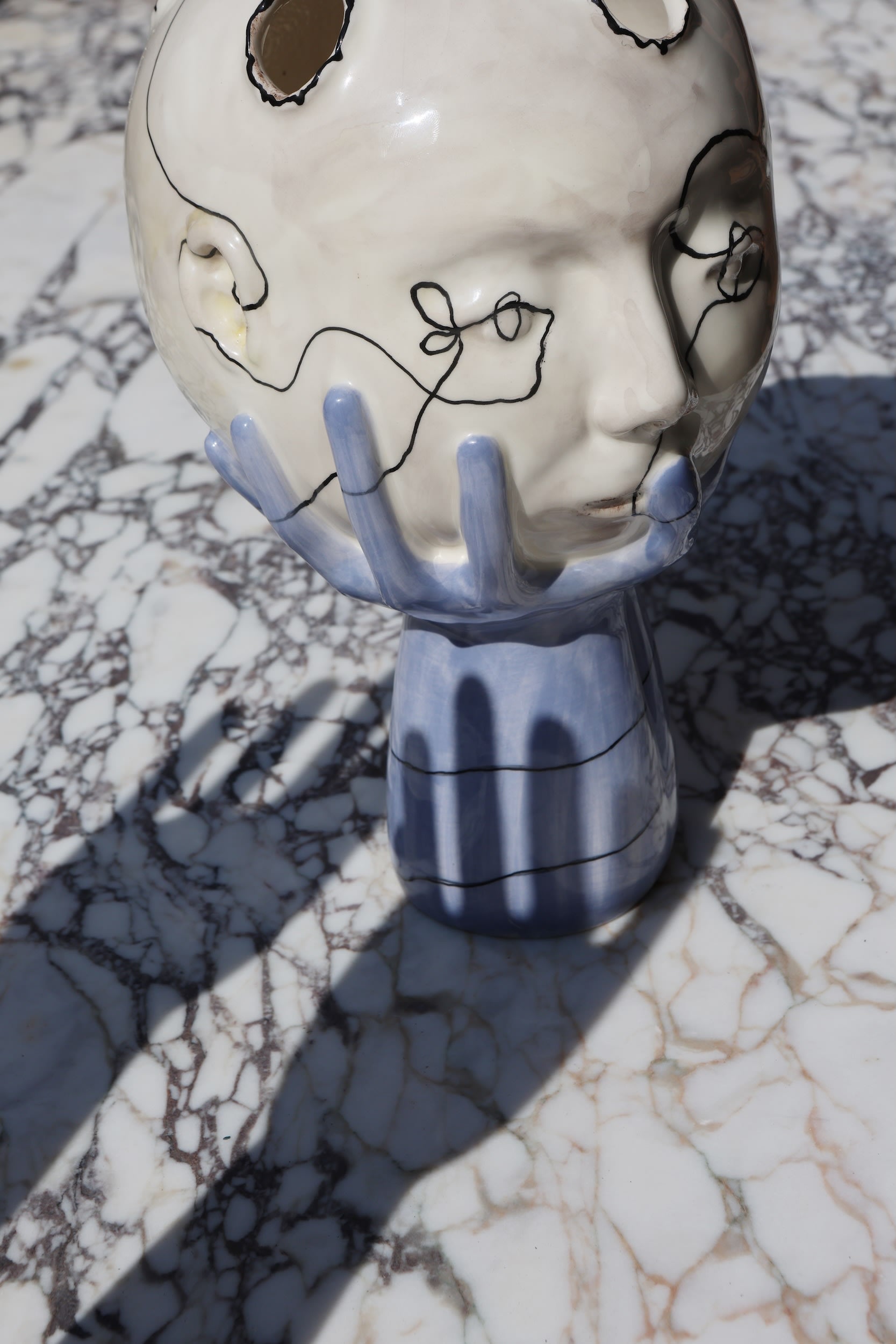 Head in Hands Hand Made Sculptural Ceramic Vase — in context