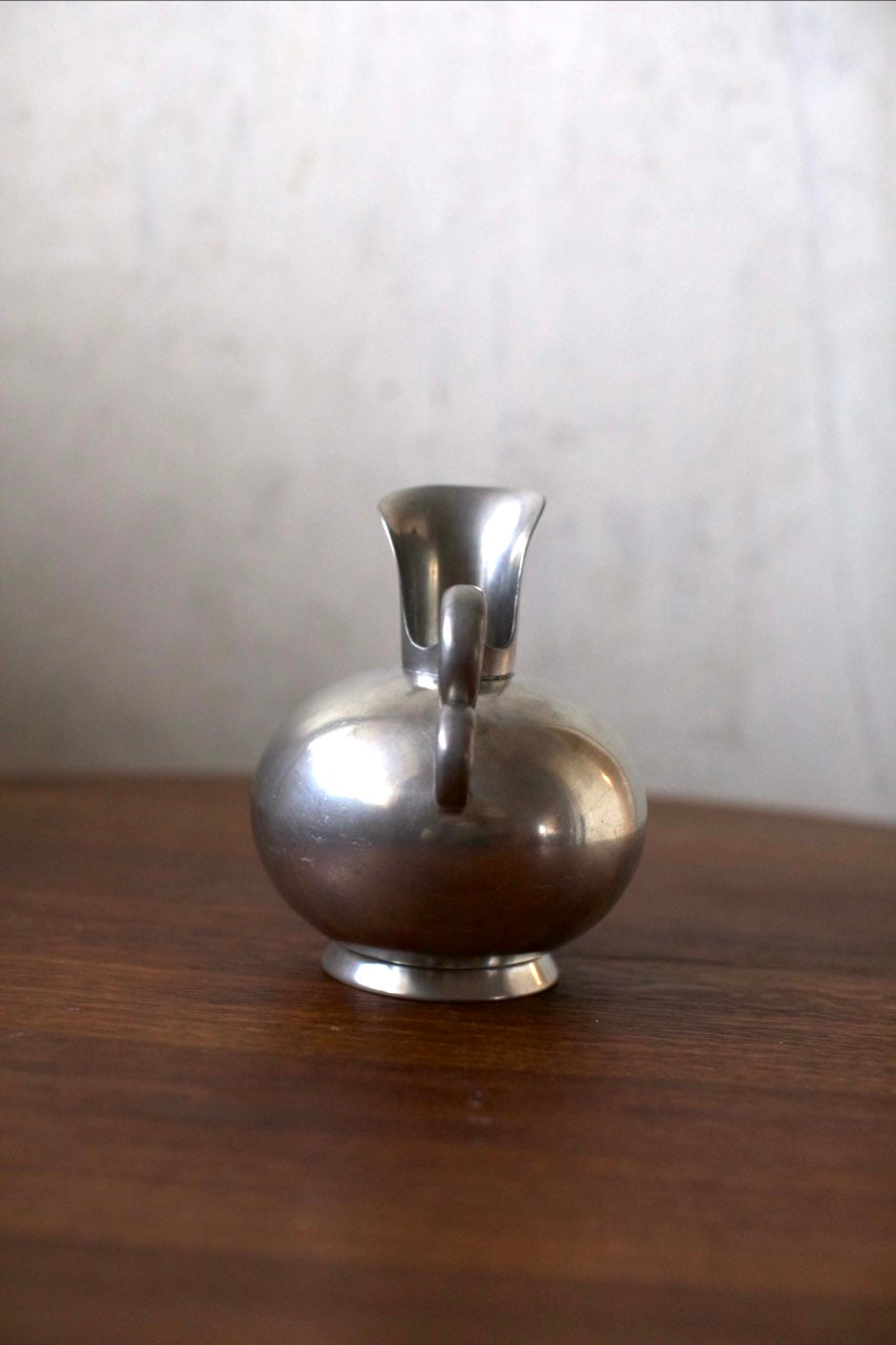 Tin Vase — front view on wooden table with textured surface