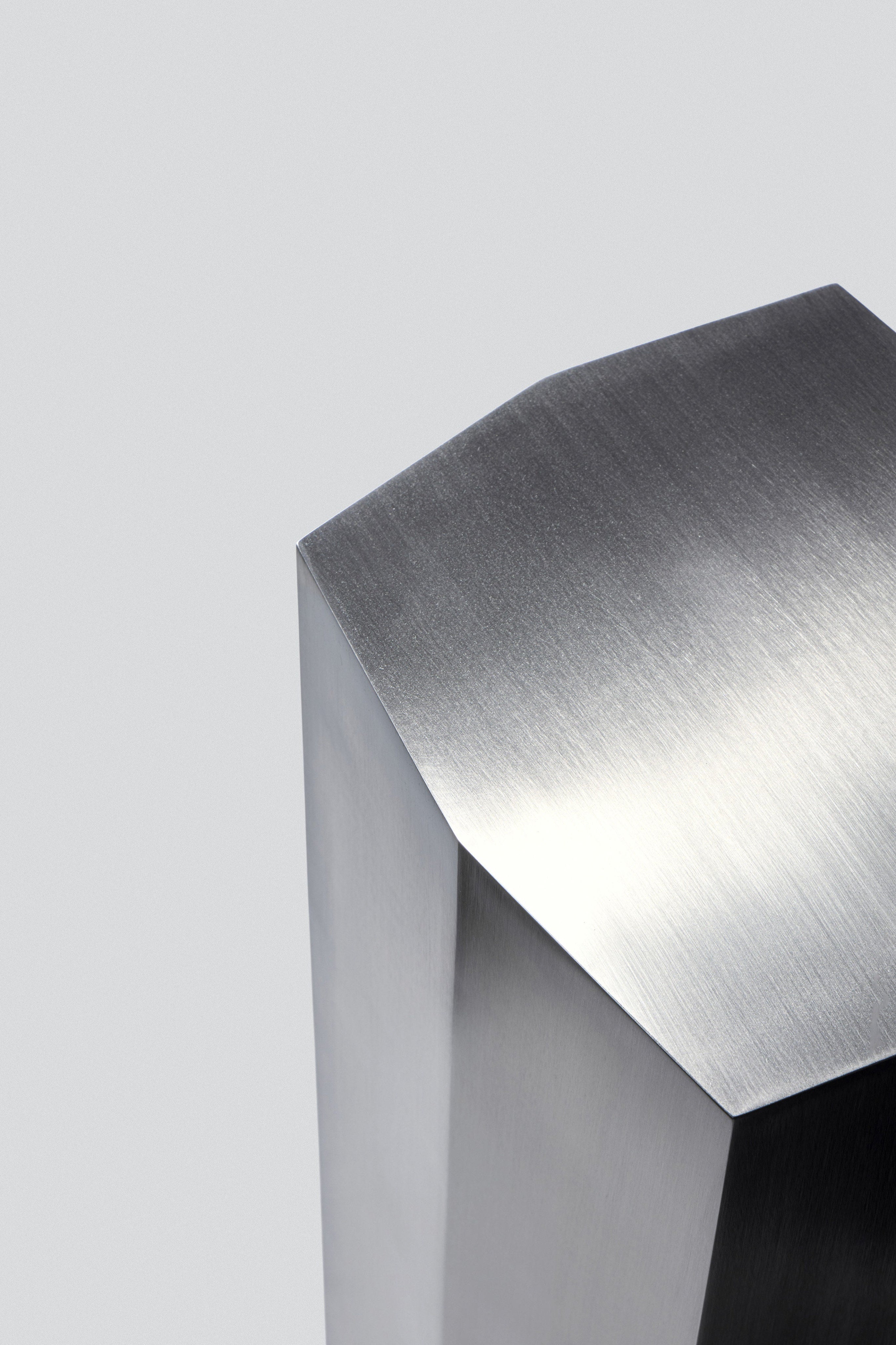 Ame II' Steel Pedestal — close-up of brushed steel surface