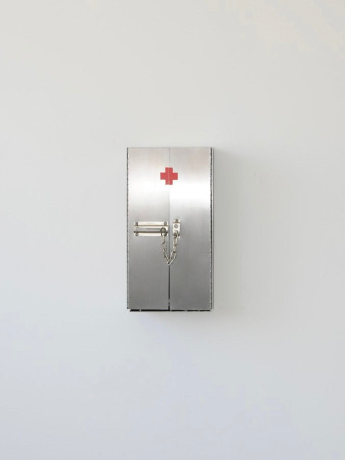 Wax Clock' Wall Candleholder — side view against a white wall