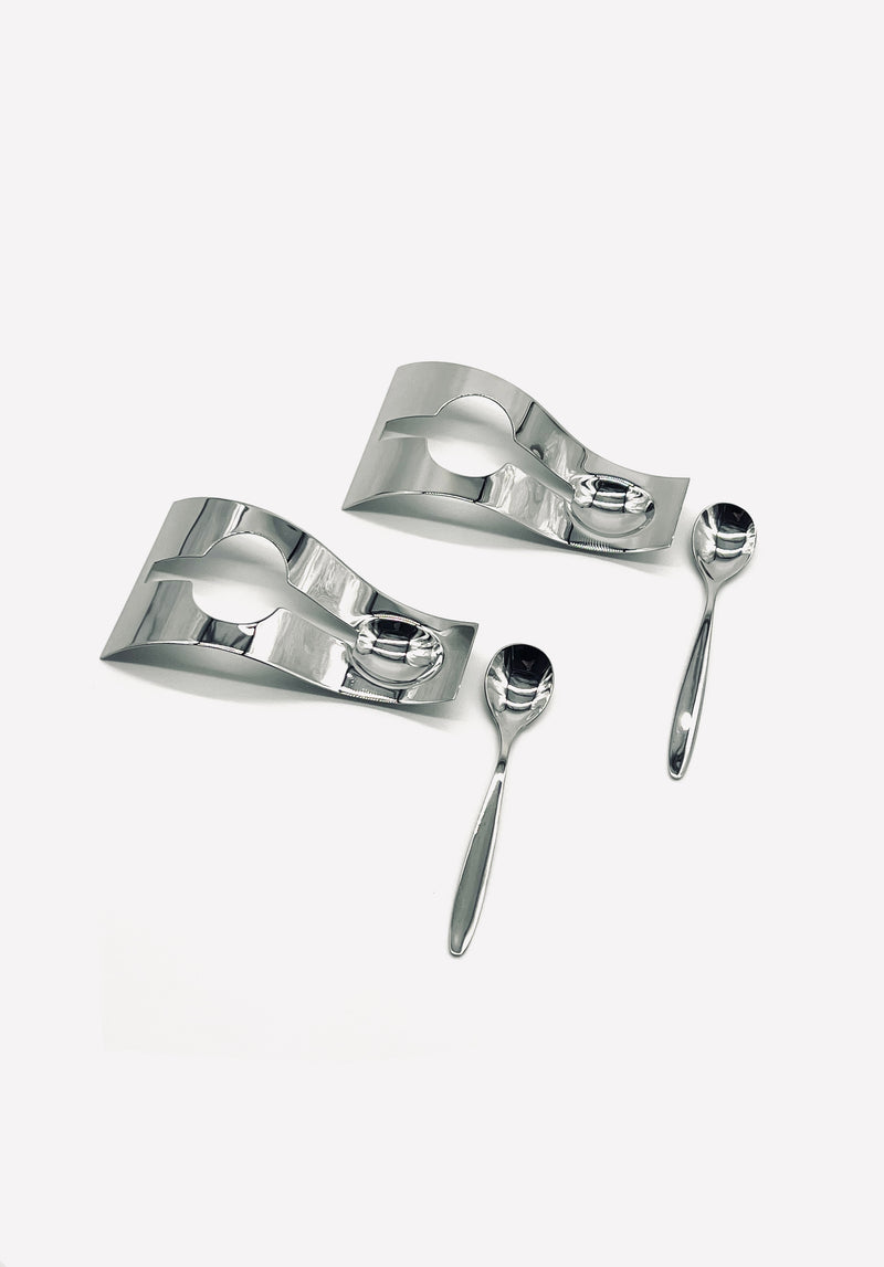 Two vintage swirl stainless steel egg cups with spoons detail view