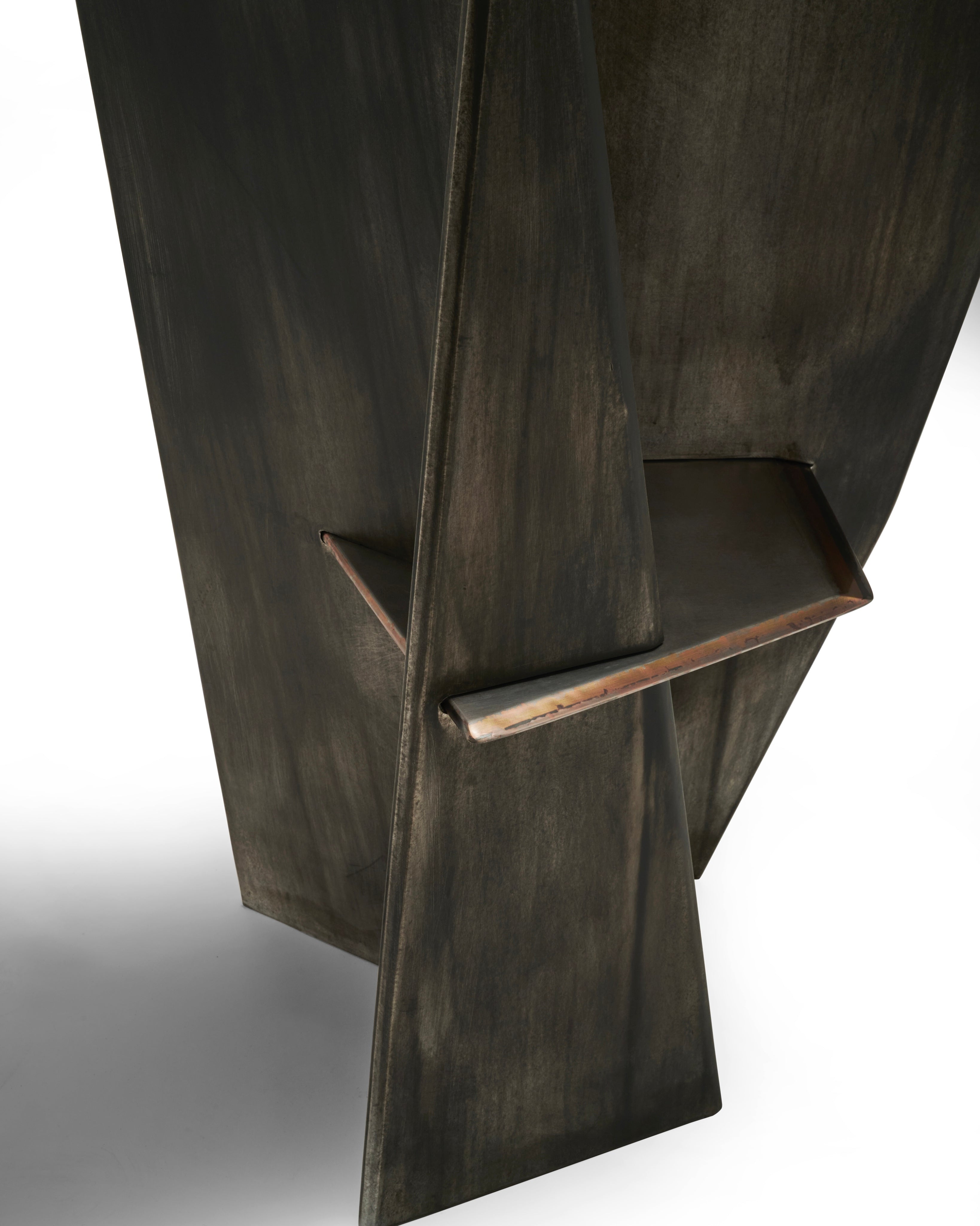 HARAKIRI Conceptual Chair in Metal and Steel — angled view highlighting dark metal finish
