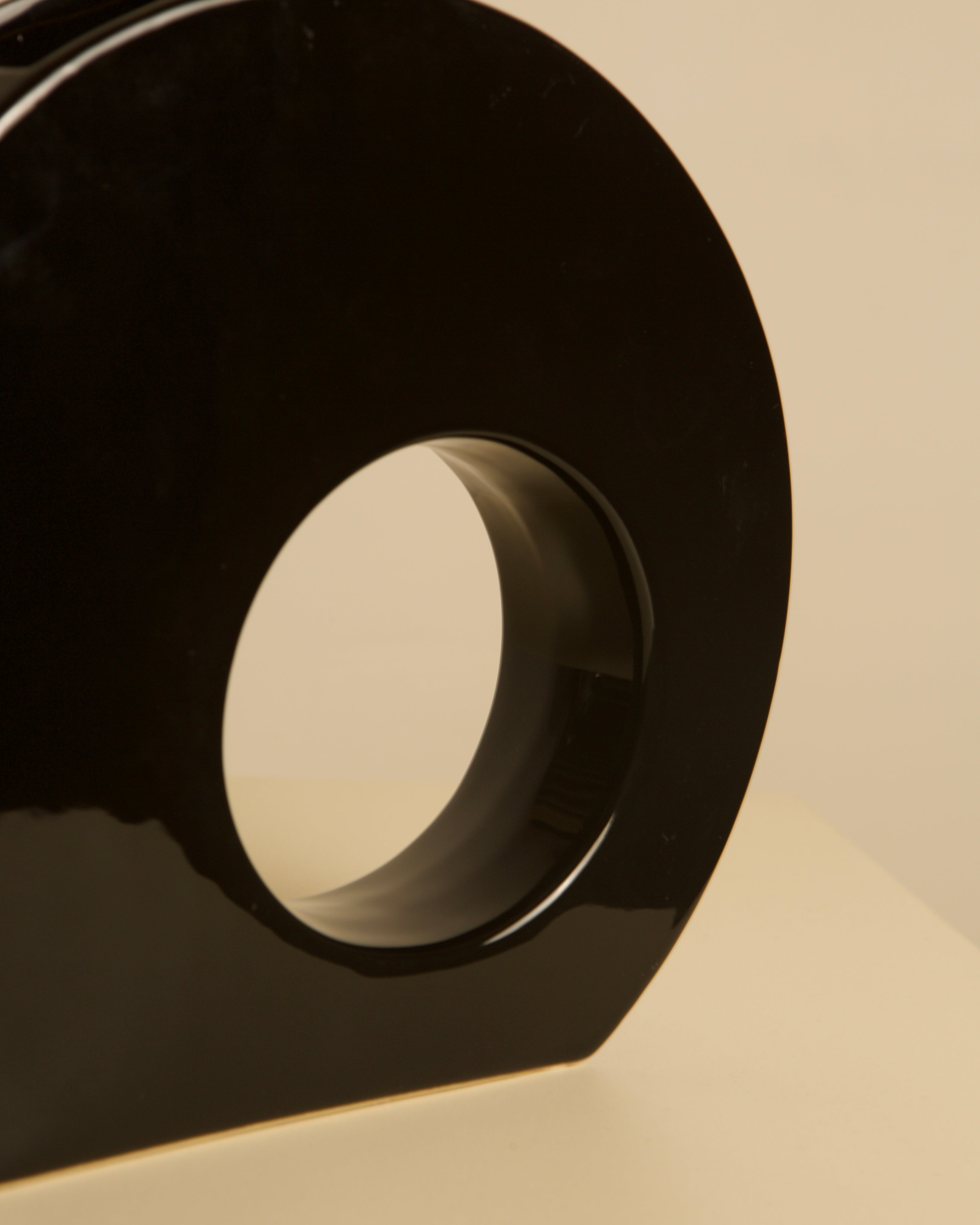 Black ceramic Vase by Sicart 80's — side angle showing circular cutout