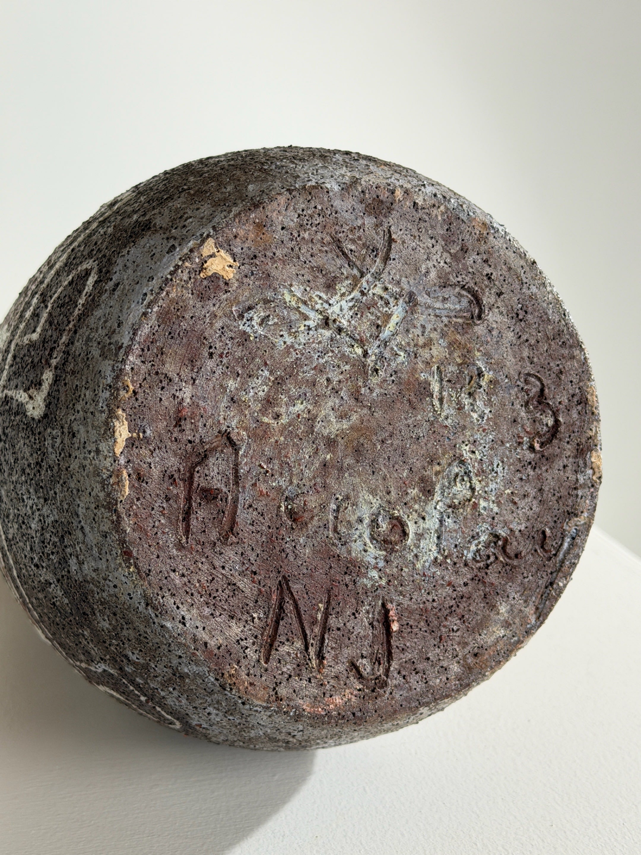 Rare bottle by the potters of Accolay, France, circa 1960 — back view showing textured ceramic base
