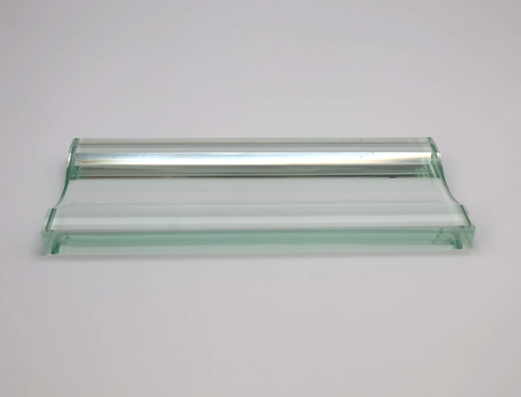 Mid-Century FontanaArte Sculptural Beveled Crystal Pen Tray — Italy, 1950s — top view on white background