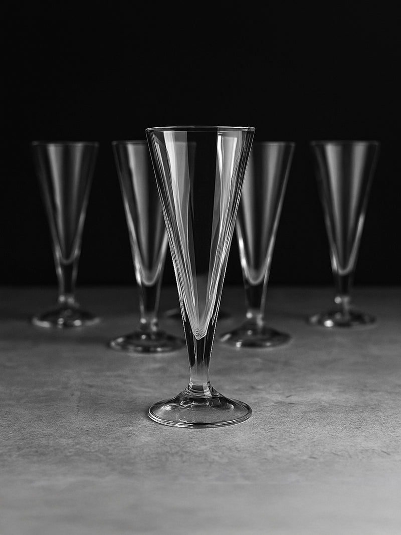 Set of crystal champagne flutes with Art Deco conical design