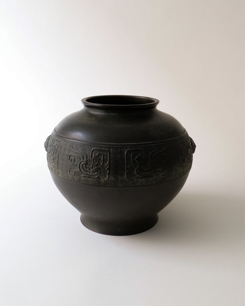 Dark bronze ikebana vase with carved relief band, Japan 1900s