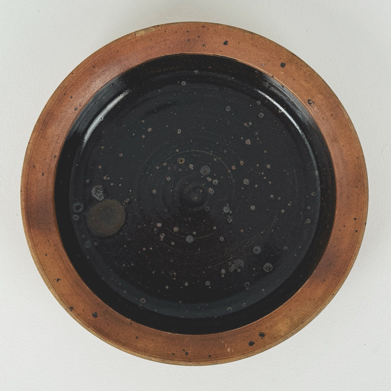 Large stoneware bowl with dark glaze by Pierre Digan, 1960s