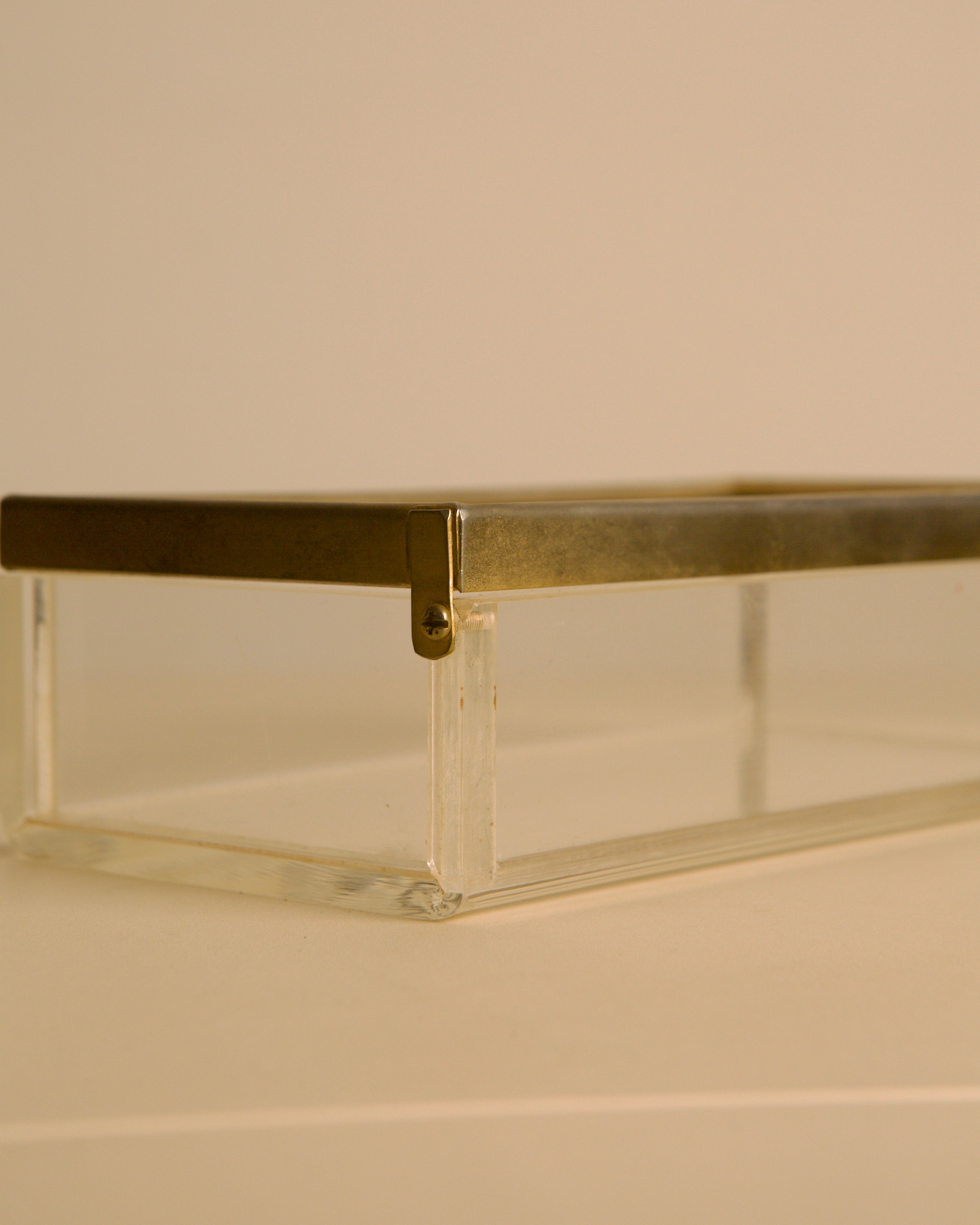 talian rectangular plexiglass box with metal trim, 1970s — side angle