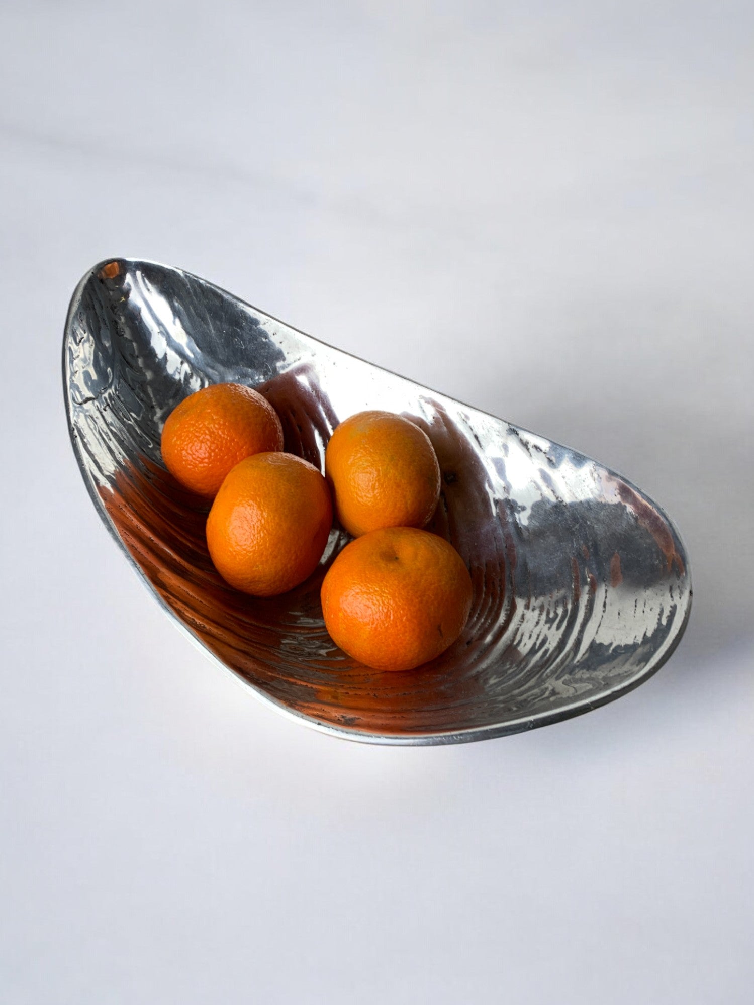 Large Mussel Shell Vide-Poches, Chromed Metal, Italy, 1970s — side angle with oranges inside