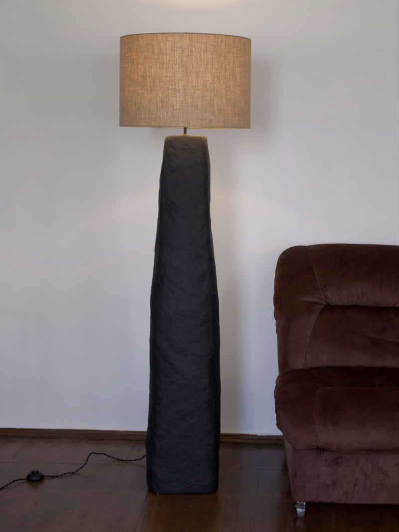 Skelia Sculptural Floor Lamp — close-up of textured black base and linen shade