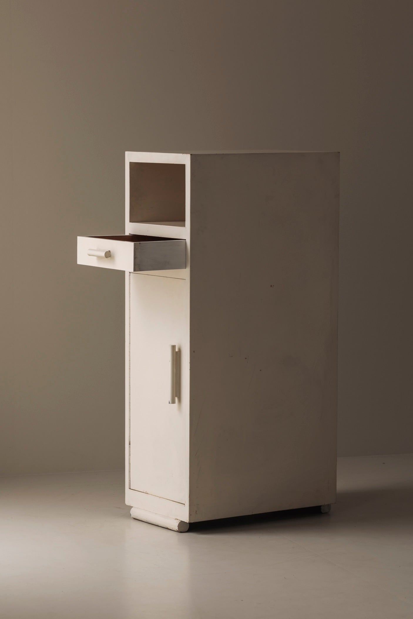 Elegant Modernist Cabinet from the 1930s — side view with white finish and drawer