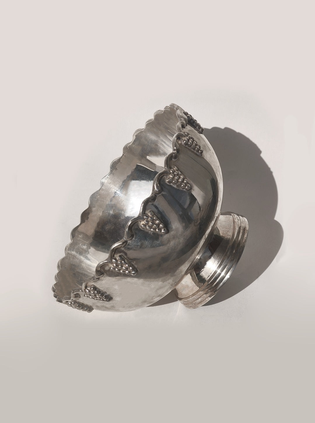 Silver-plated decorative fruit cup with grape motif detail